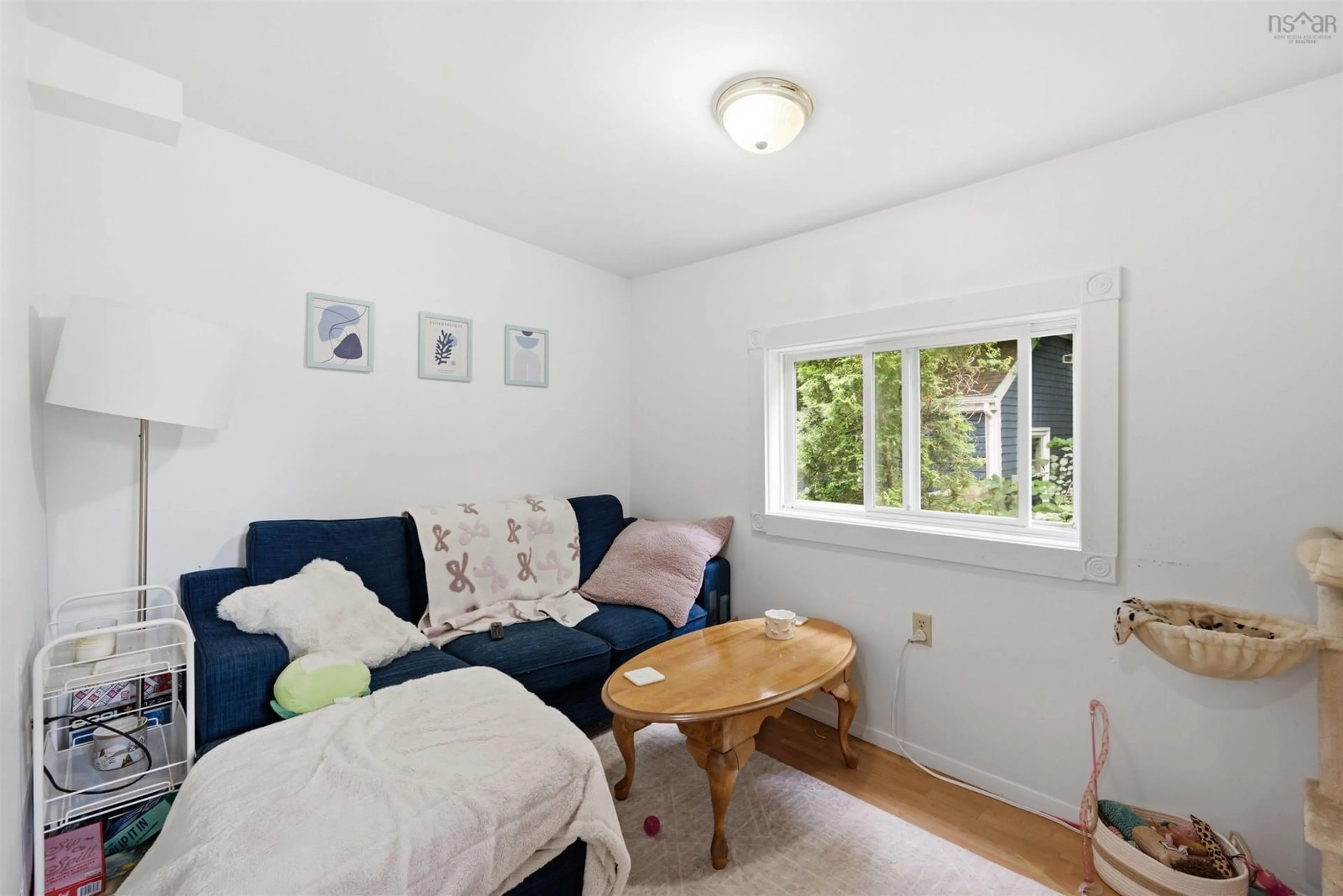 Living room with furniture, wood/laminate floor for 1747 Vernon St, Halifax Nova Scotia B3H 3N3