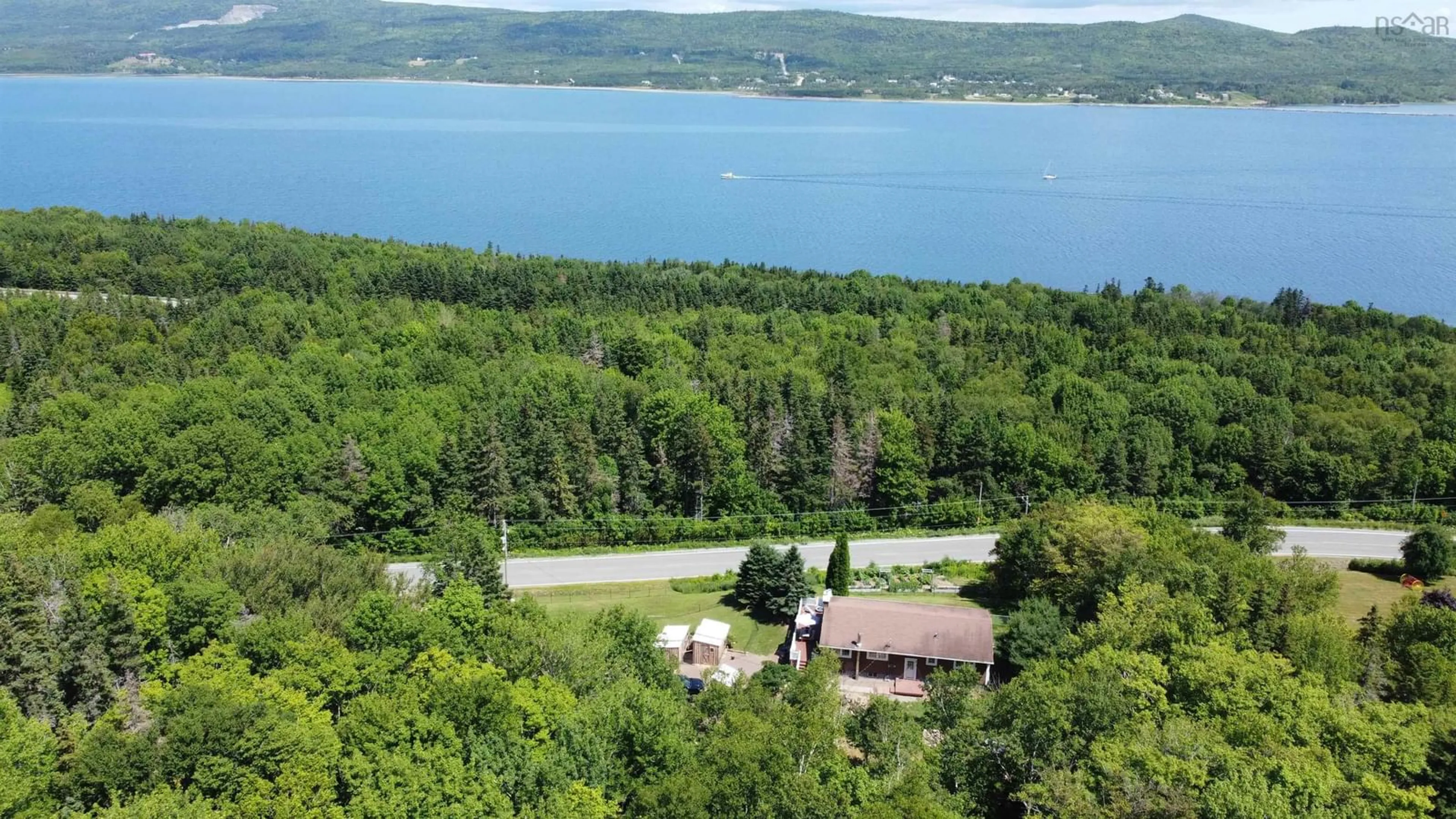 A pic from outside/outdoor area/front of a property/back of a property/a pic from drone, water/lake/river/ocean view for 13748 Highway 4, Aulds Cove Nova Scotia B0H 1P0