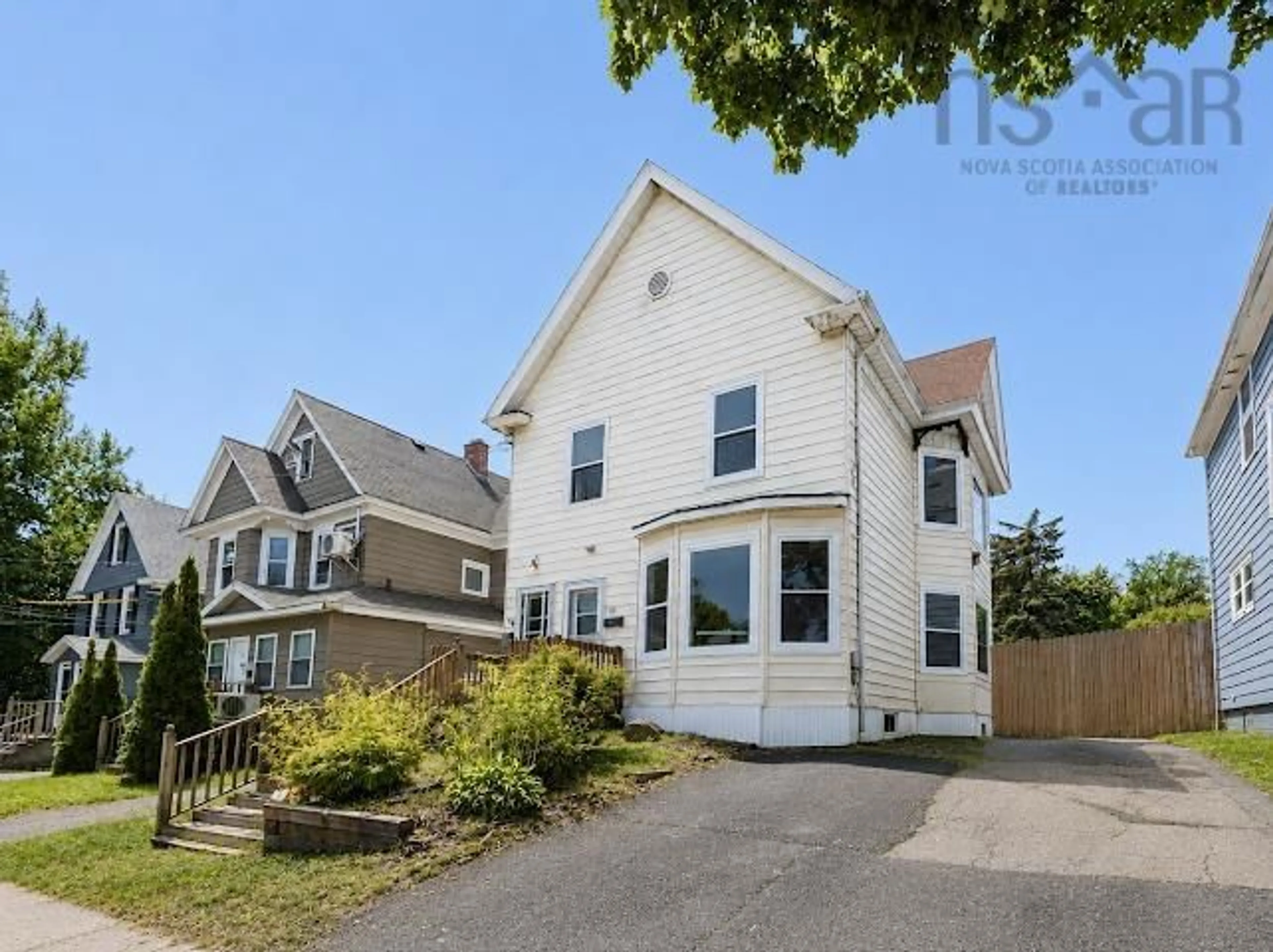 A pic from outside/outdoor area/front of a property/back of a property/a pic from drone, street for 18/20 Queen St, Sydney Nova Scotia B1S 2Y9