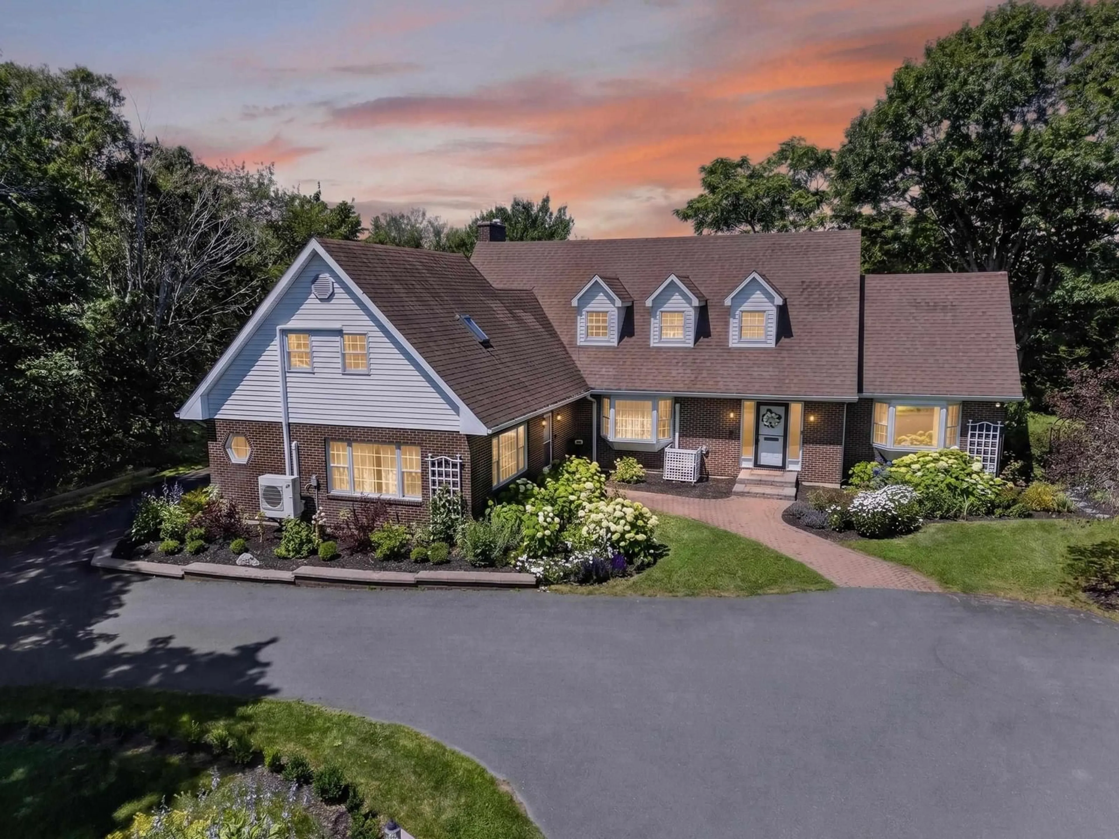 A pic from outside/outdoor area/front of a property/back of a property/a pic from drone, mountain view for 1864 Kings Rd, Sydney River Nova Scotia B1L 1C5