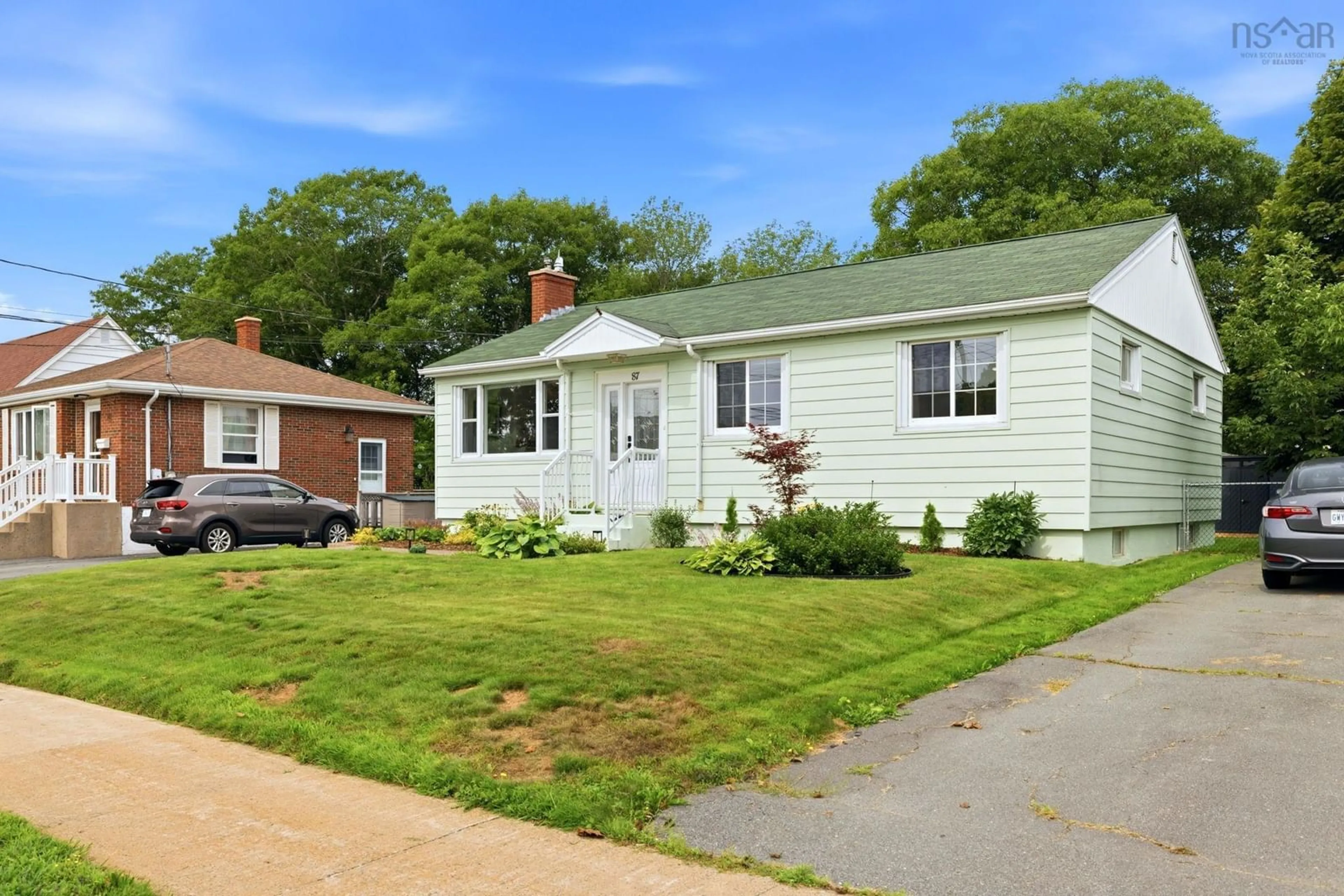 Home with vinyl exterior material, street for 87 Russell St, Dartmouth Nova Scotia B3A 3N4