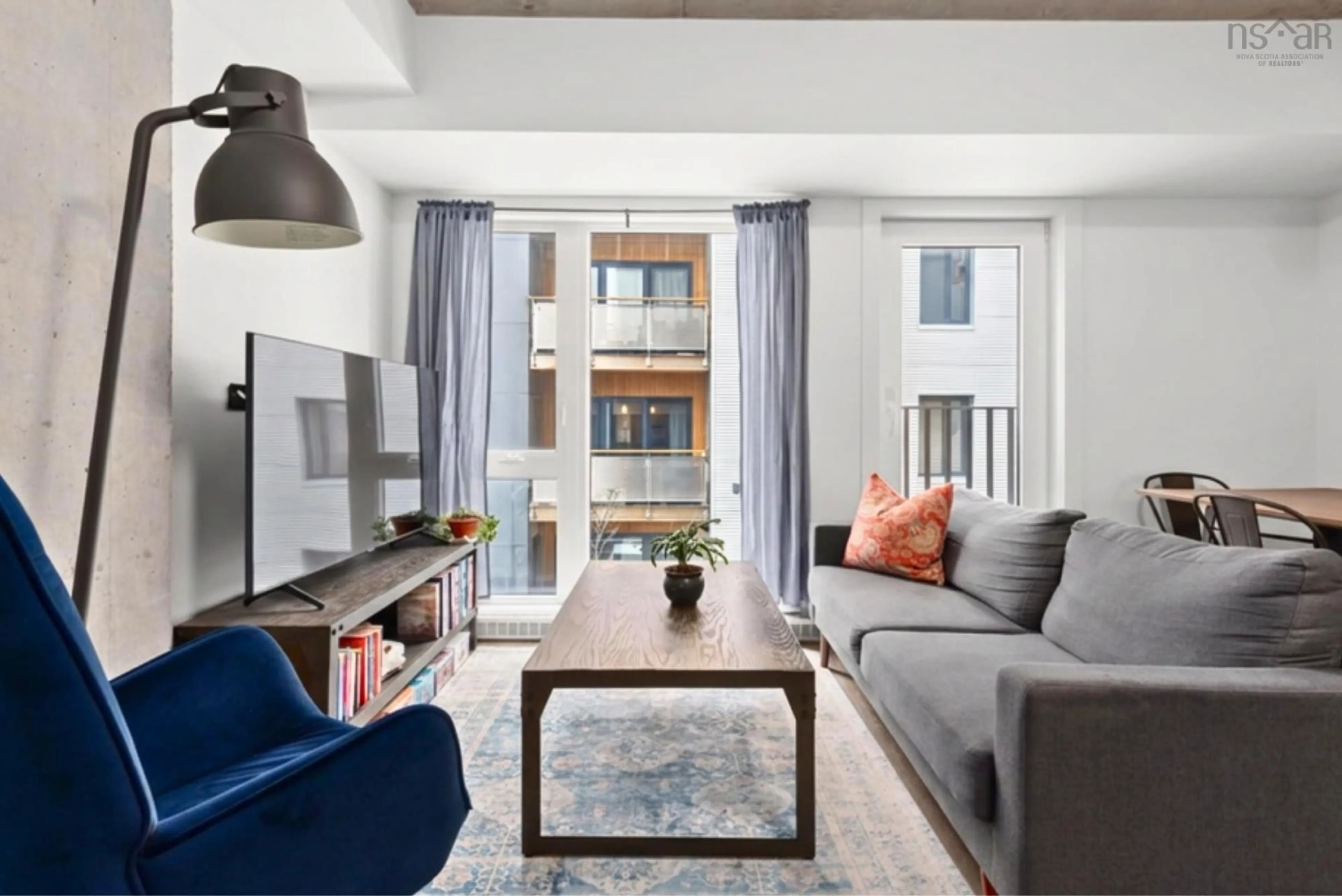 Living room with furniture, unknown for 5684 West St #208, Halifax Nova Scotia B3K 1H7