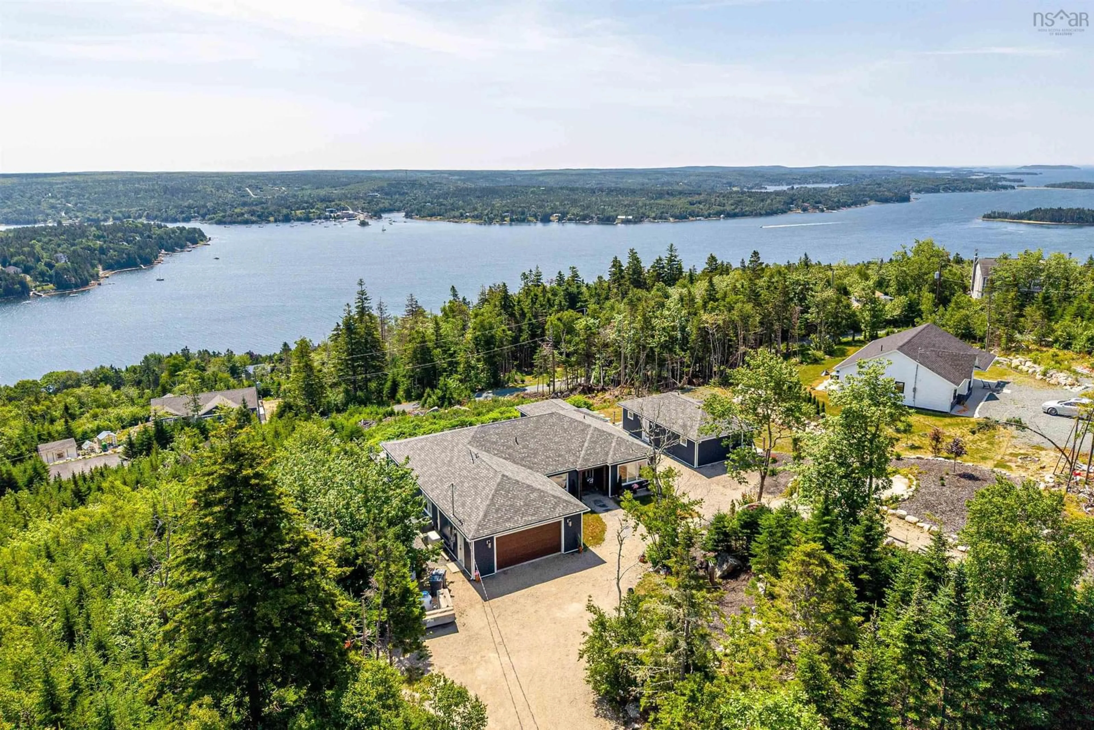 A pic from outside/outdoor area/front of a property/back of a property/a pic from drone, water/lake/river/ocean view for 107 Amelinda Cres, Boutiliers Point Nova Scotia B3Z 1X5