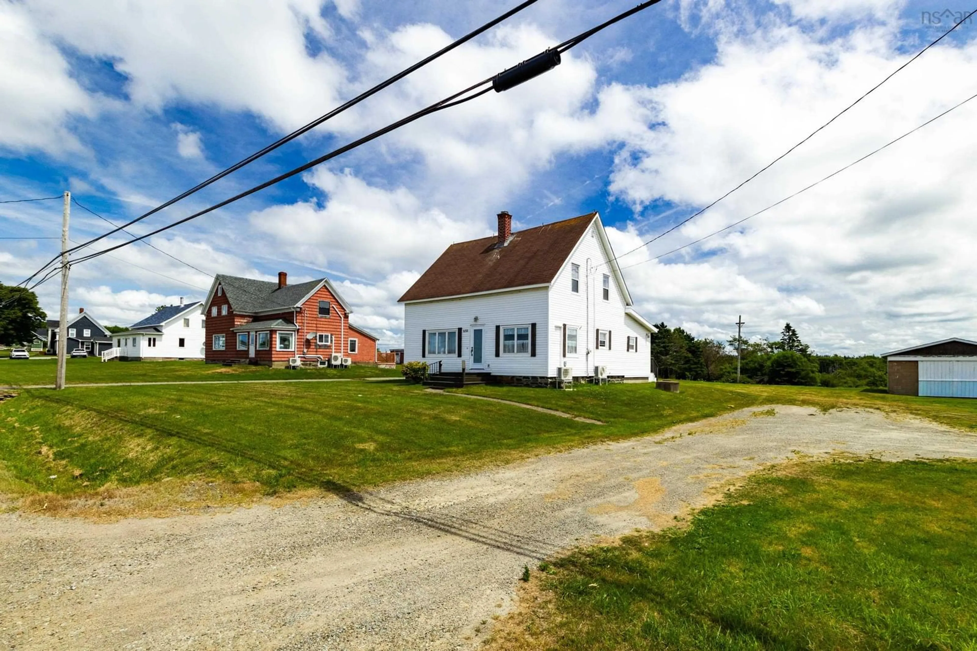 A pic from outside/outdoor area/front of a property/back of a property/a pic from drone, street for 650 Highway 1, Comeauville Nova Scotia B0W 1Z0