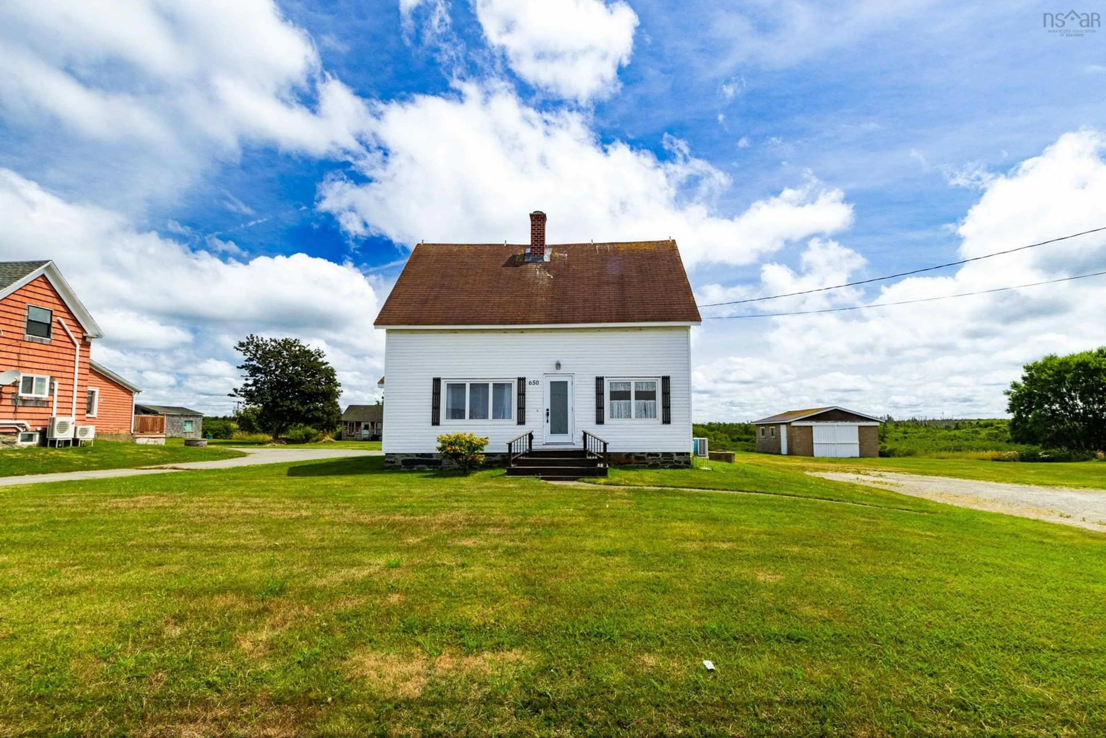 A pic from outside/outdoor area/front of a property/back of a property/a pic from drone, building for 650 Highway 1, Comeauville Nova Scotia B0W 1Z0
