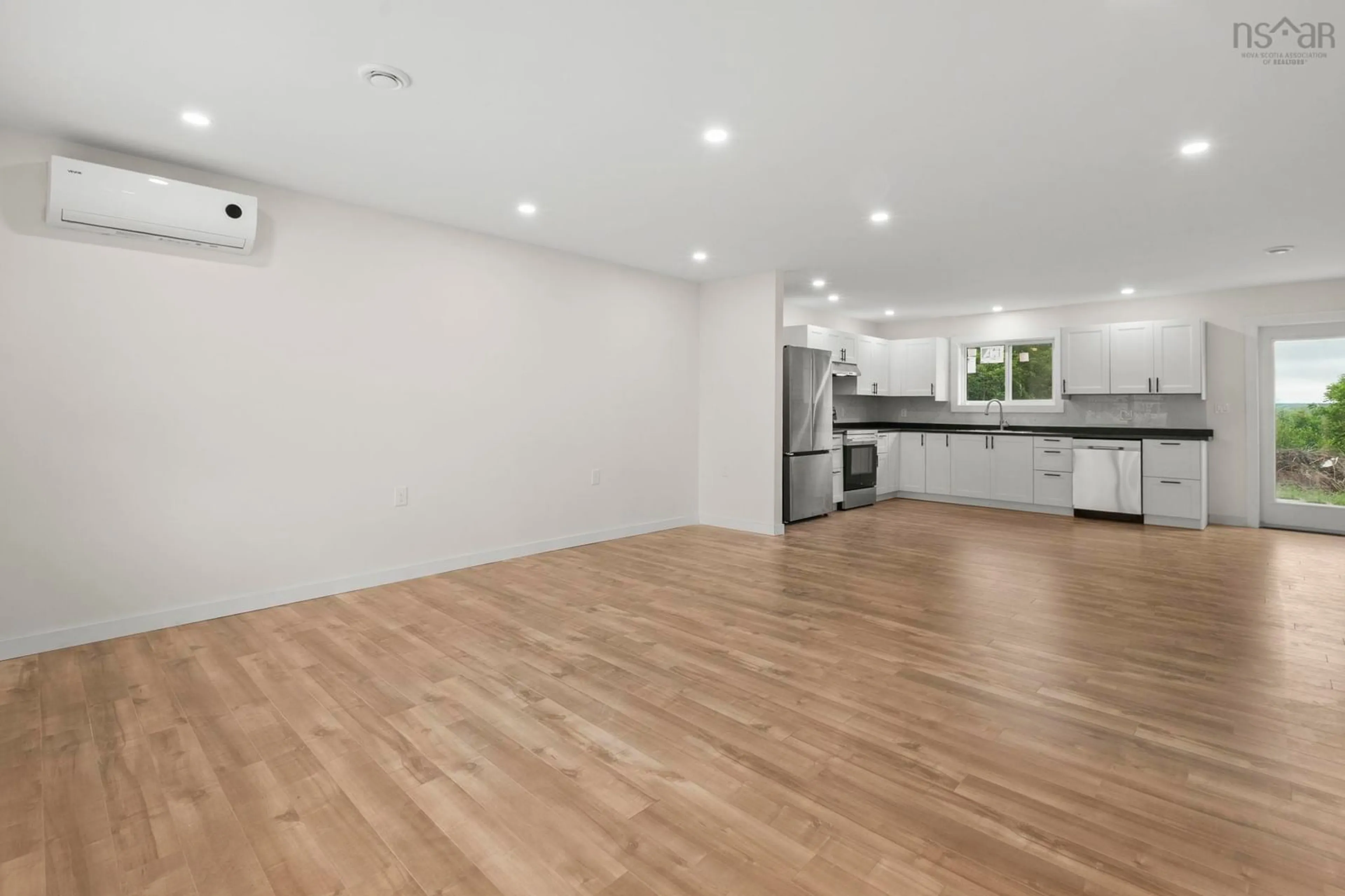 Open concept kitchen, wood/laminate floor for 183 Moore Rd, Antrim Nova Scotia B0N 1Y0