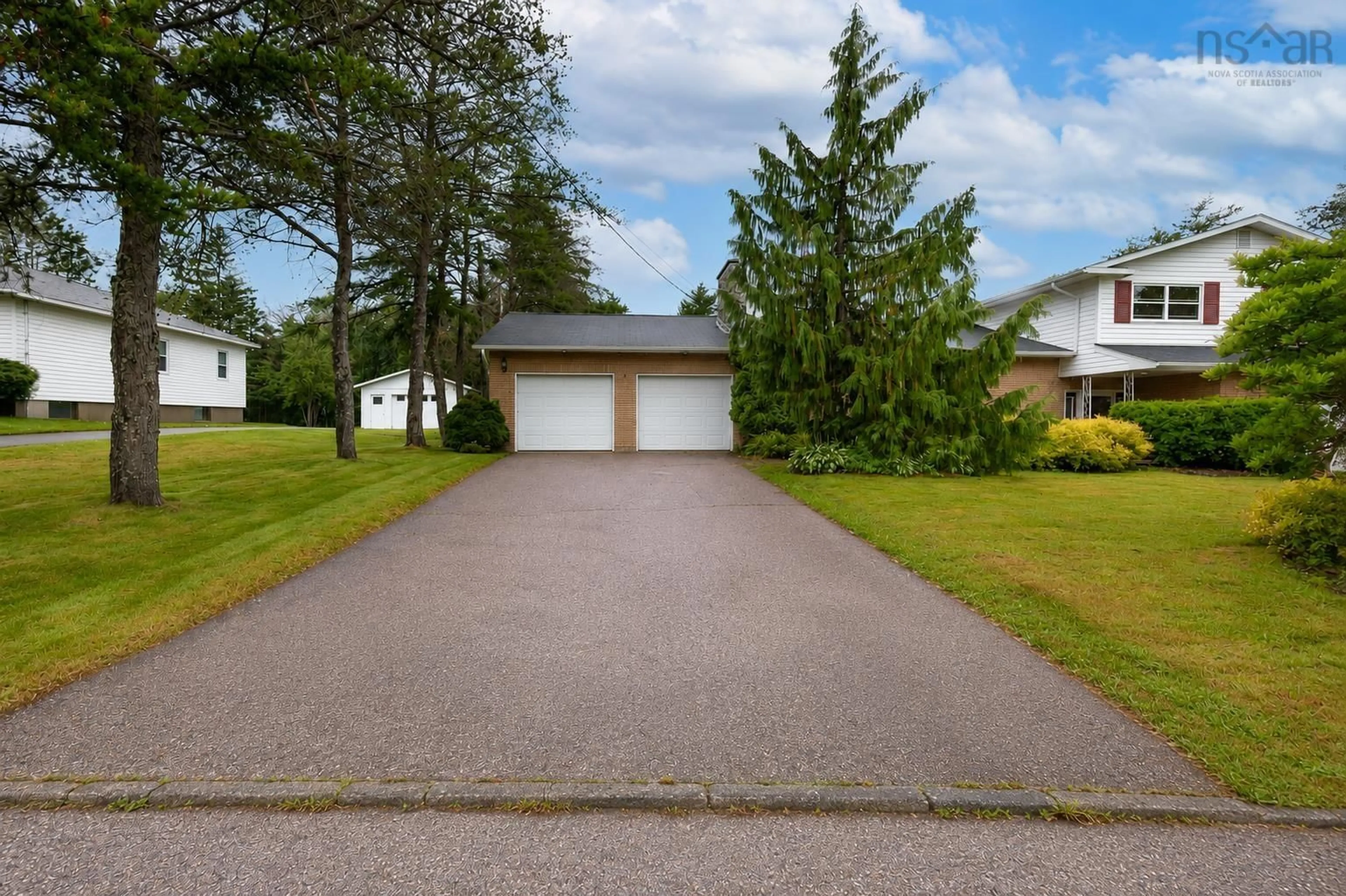 A pic from outside/outdoor area/front of a property/back of a property/a pic from drone, street for 34 Macdougall Hts, Sydney River Nova Scotia B1S 3A7