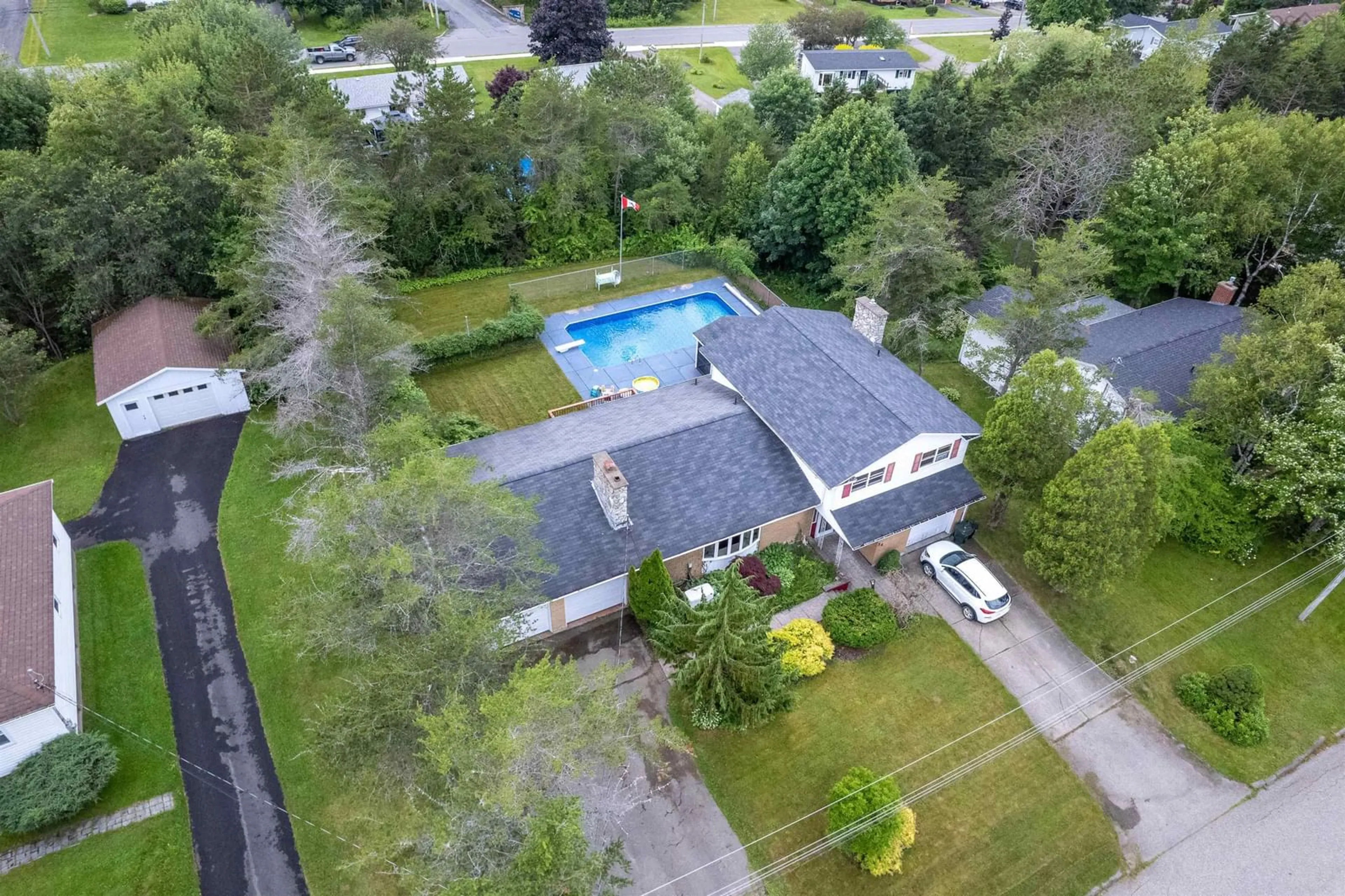 A pic from outside/outdoor area/front of a property/back of a property/a pic from drone, unknown for 34 Macdougall Hts, Sydney River Nova Scotia B1S 3A7
