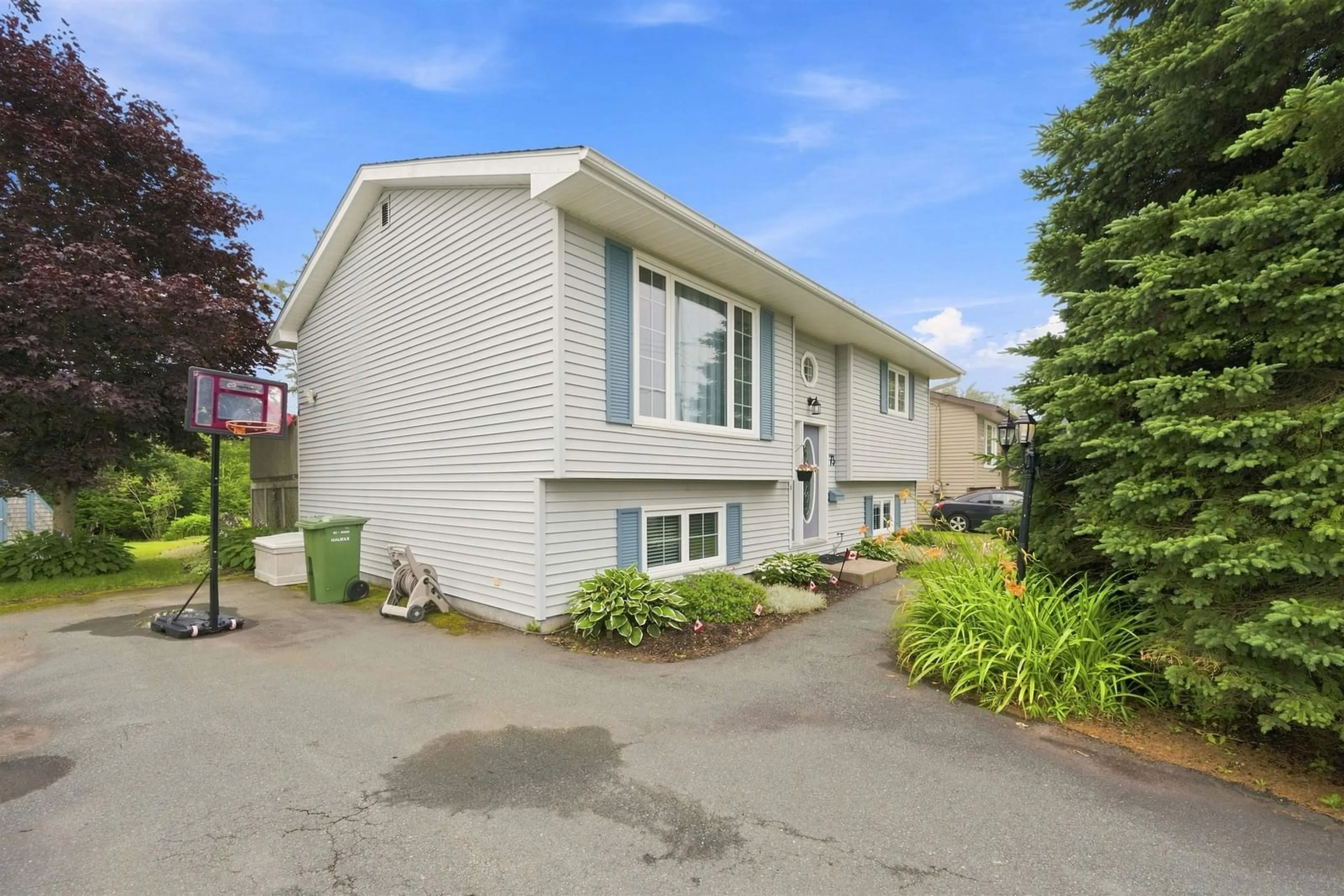 Home with vinyl exterior material, street for 73 Briarwood Dr, Eastern Passage Nova Scotia B3G 1B9