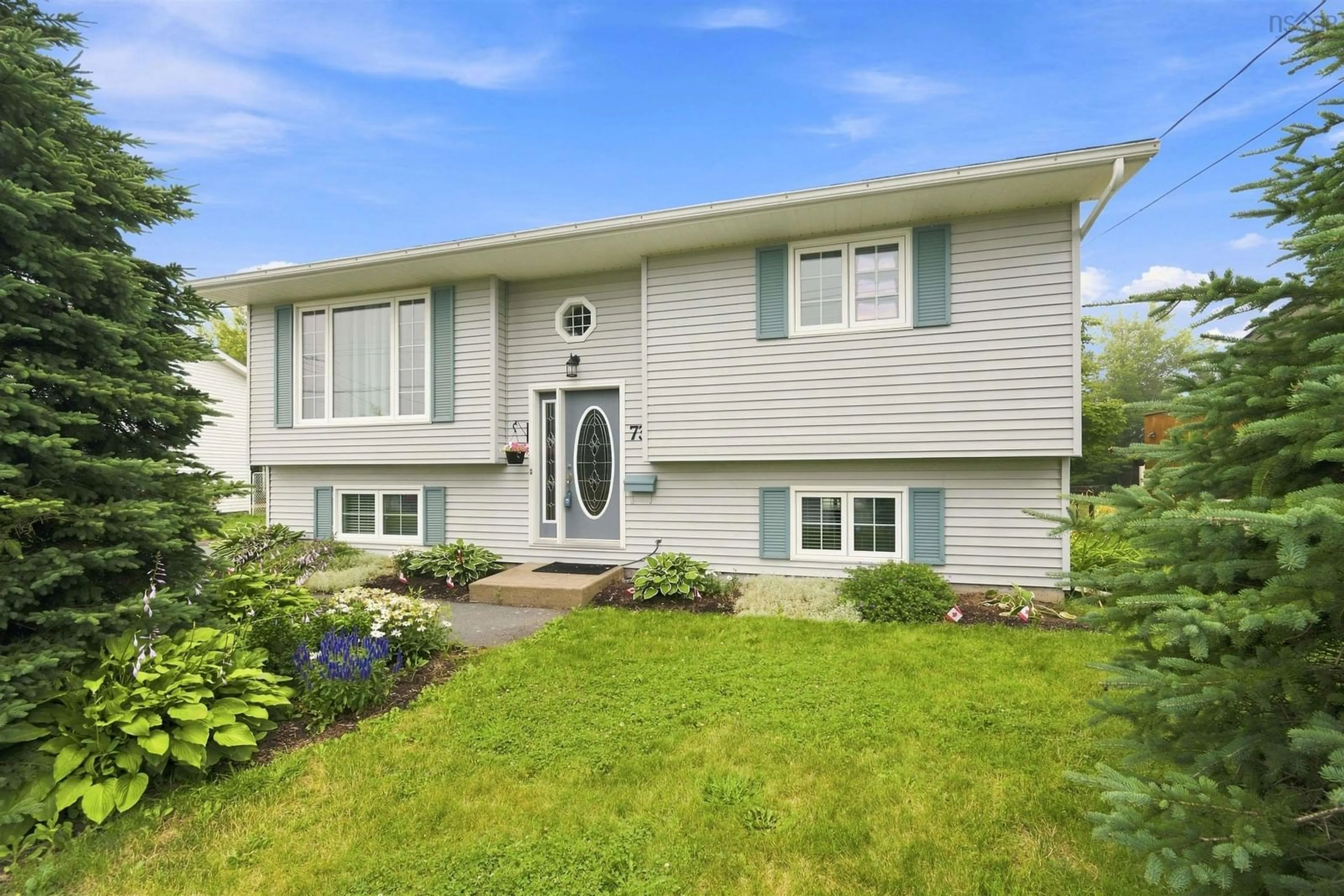 Home with vinyl exterior material, street for 73 Briarwood Dr, Eastern Passage Nova Scotia B3G 1B9