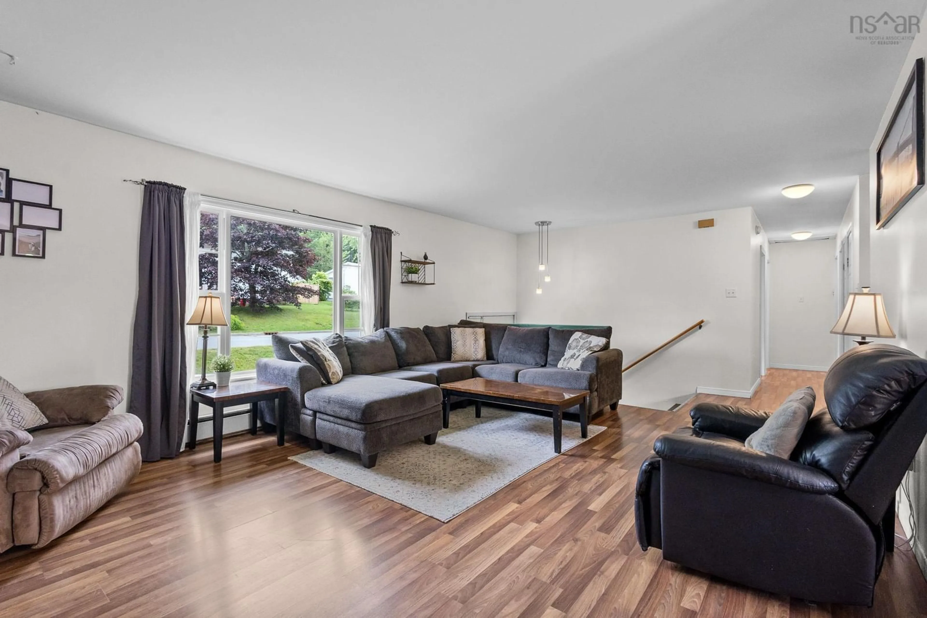 Living room with furniture, wood/laminate floor for 43 Candlewood Lane, Lower Sackville Nova Scotia B4C 1A6