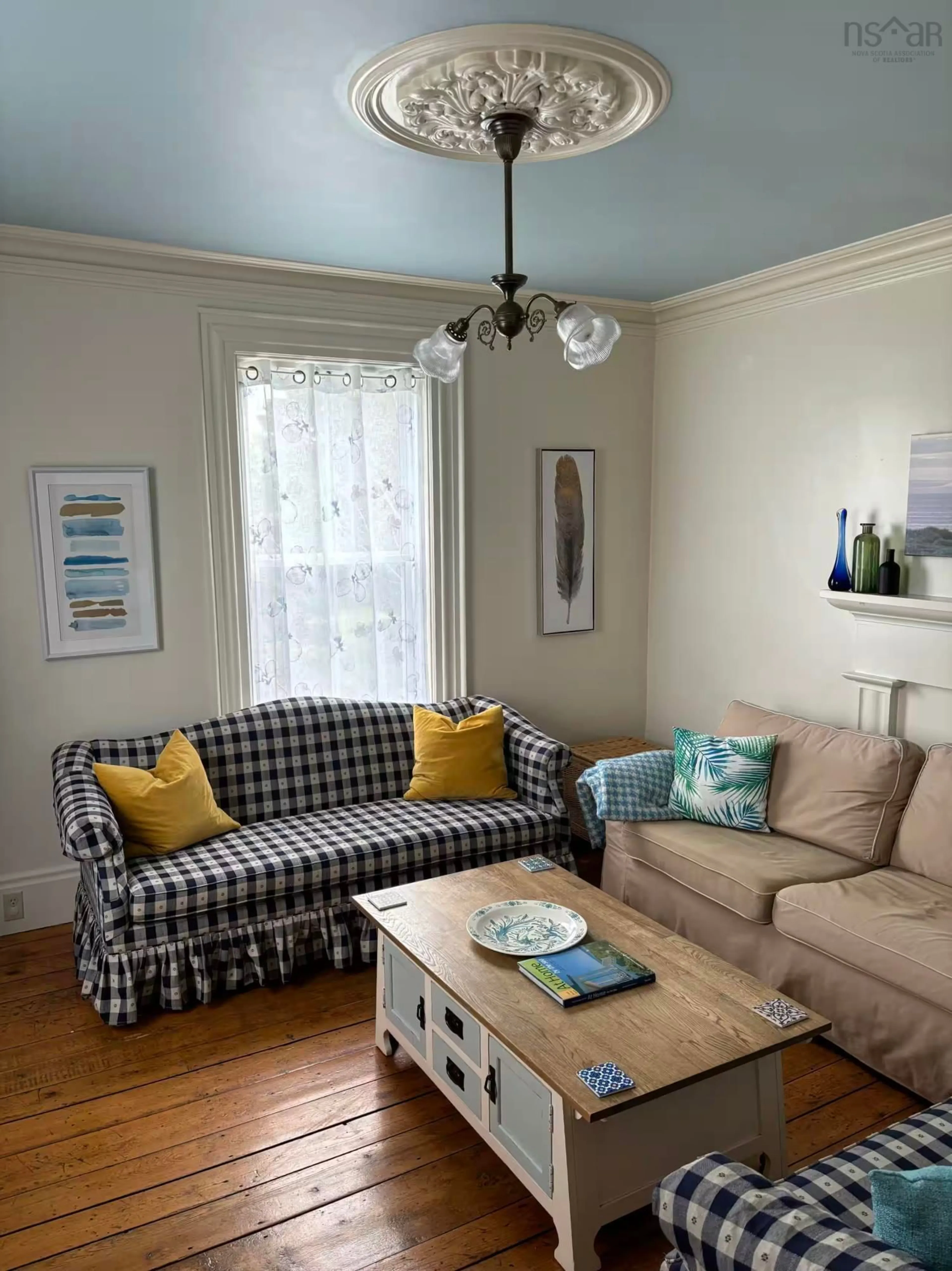 Living room with furniture, wood/laminate floor for 247 Lower Lahave Rd, Riverport Nova Scotia B0J 2X0