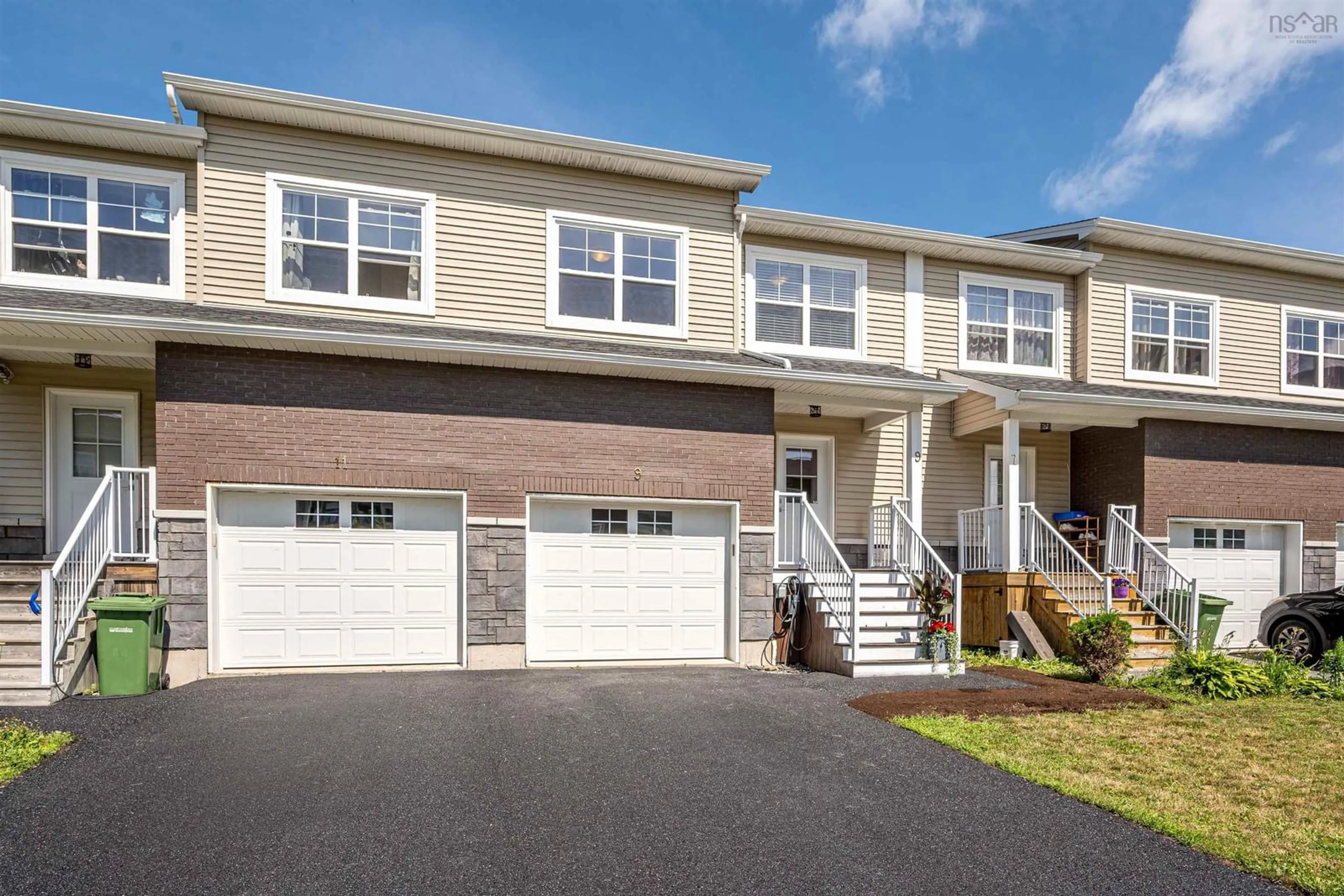 Home with vinyl exterior material, street for 9 Mona Parsons Dr, West Bedford Nova Scotia B4B 0R1