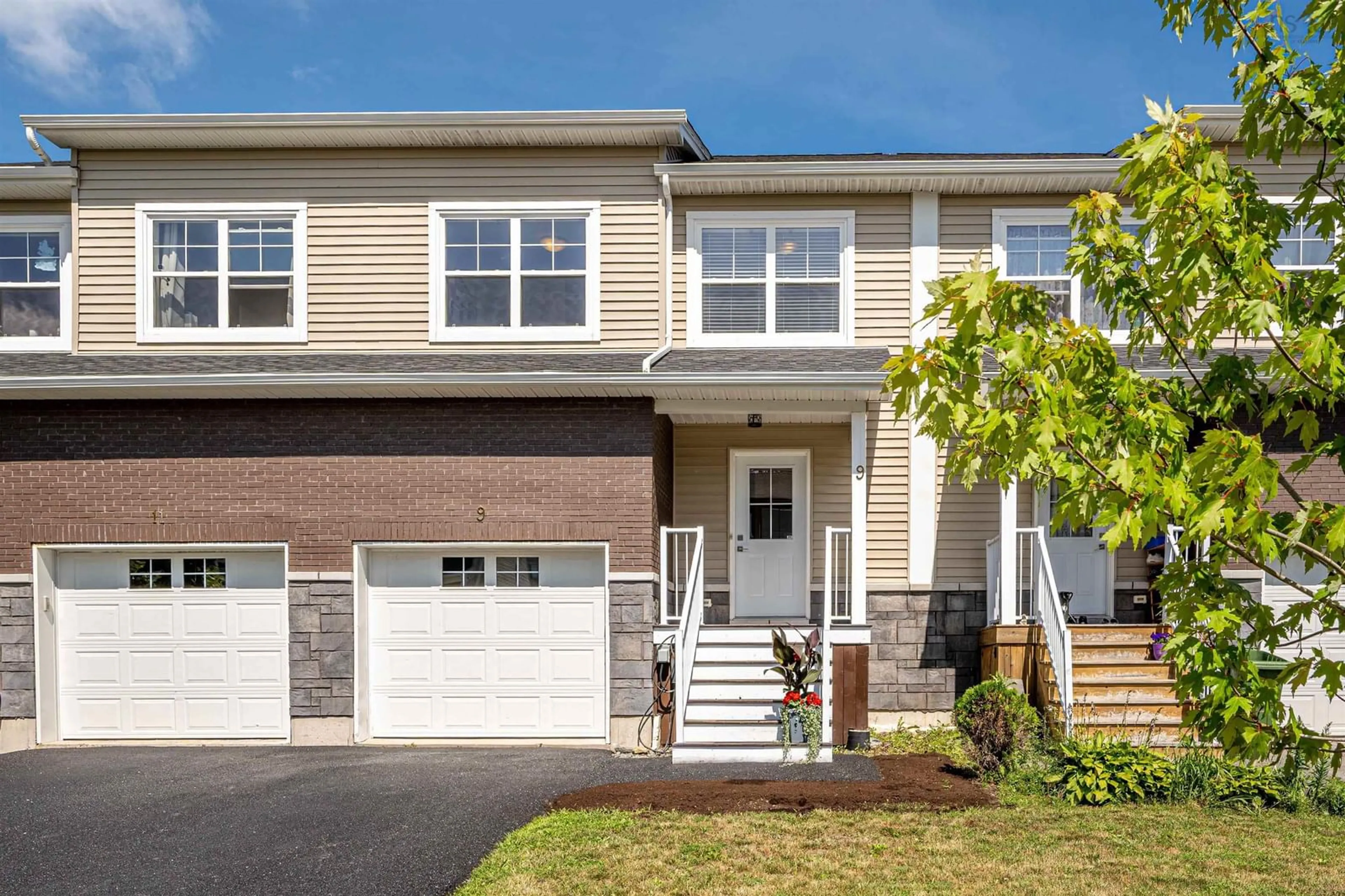 Home with vinyl exterior material, street for 9 Mona Parsons Dr, West Bedford Nova Scotia B4B 0R1