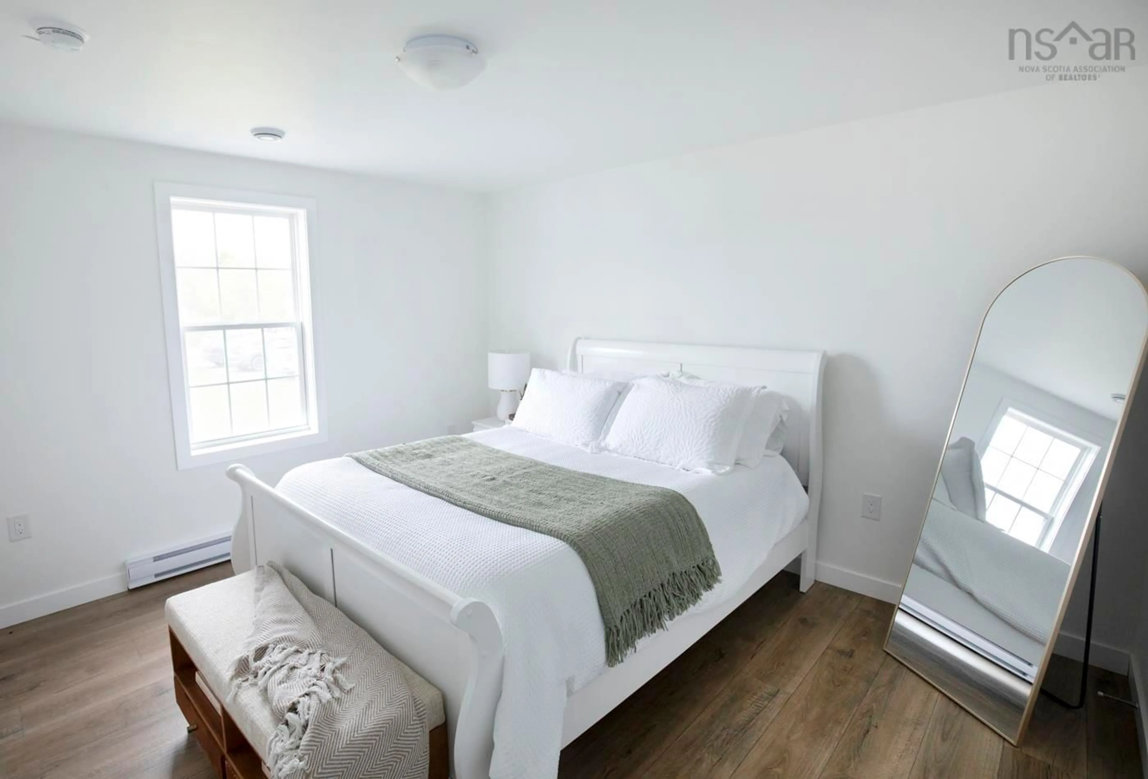 Bedroom with bed, wood/laminate floor for 1-24 Murchyville Rd, Murchyville Nova Scotia B0N 1X0