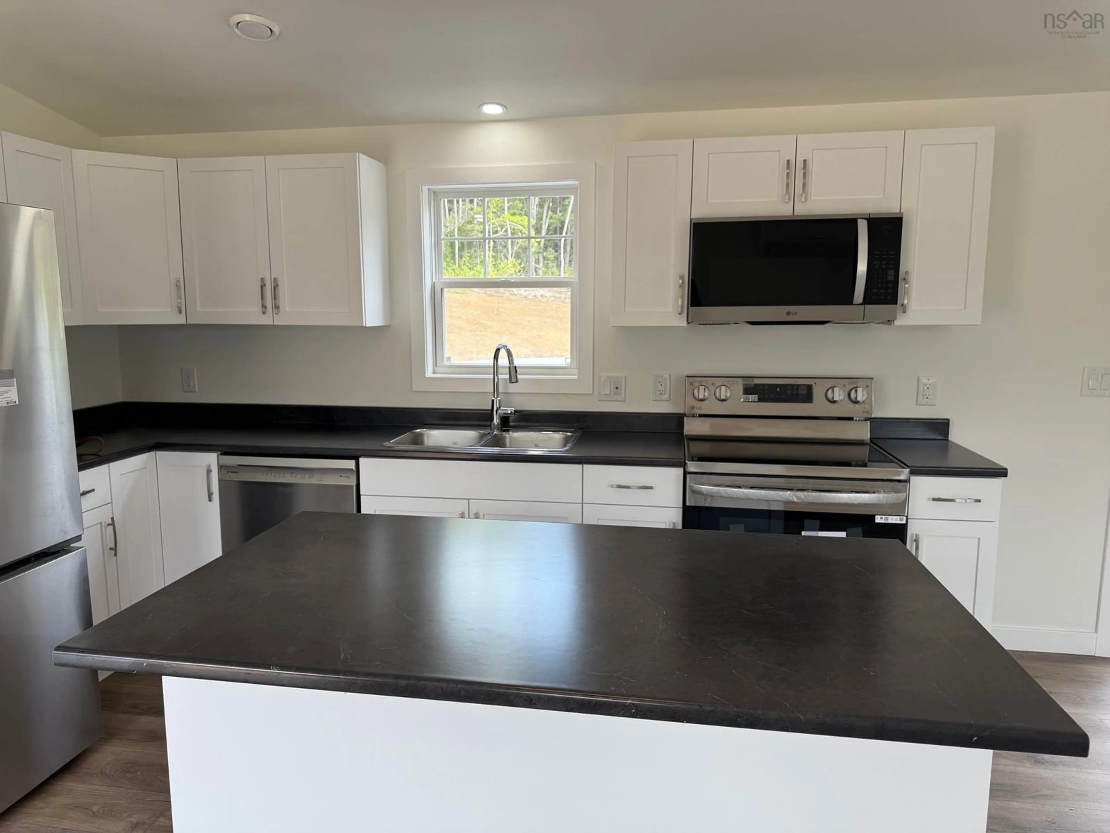 Open concept kitchen, unknown for 2-24 Murchyville Rd, Murchyville Nova Scotia B0N 1X0