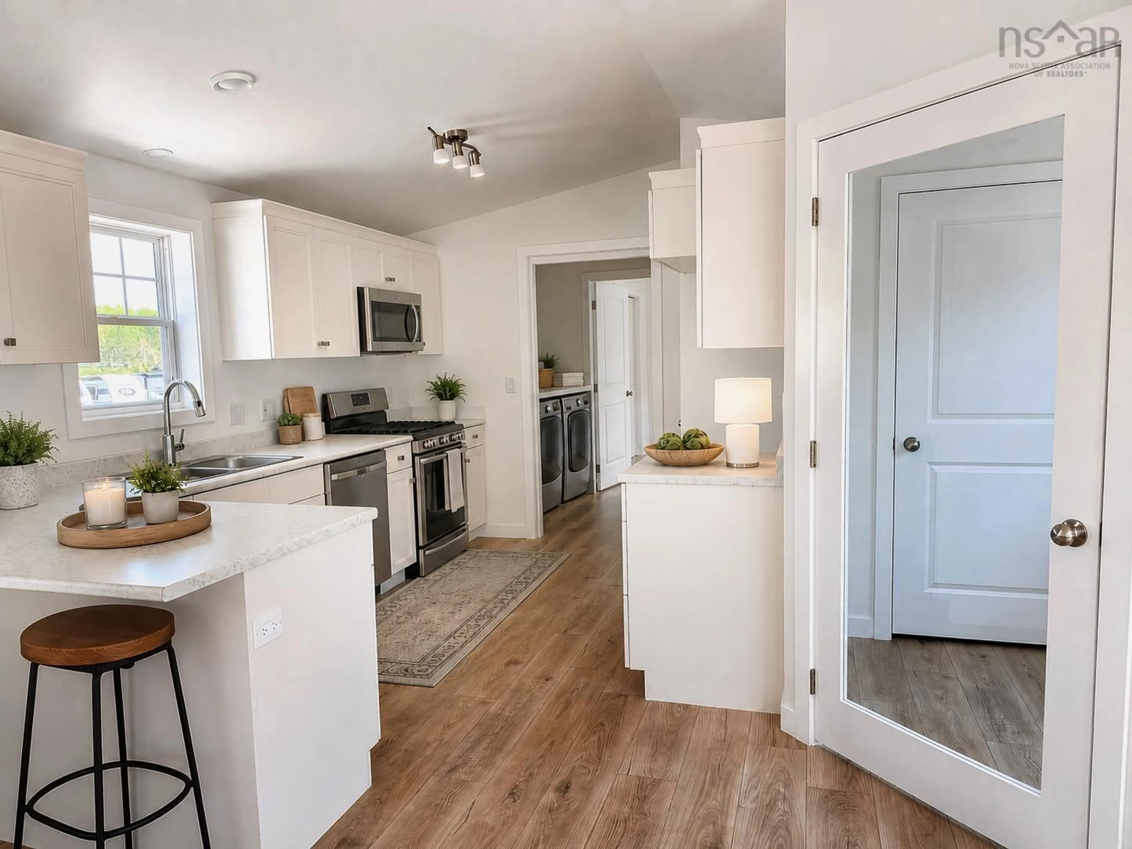 Open concept kitchen, wood/laminate floor for 4-24 Murchyville Rd, Murchyville Nova Scotia B0N 1X0