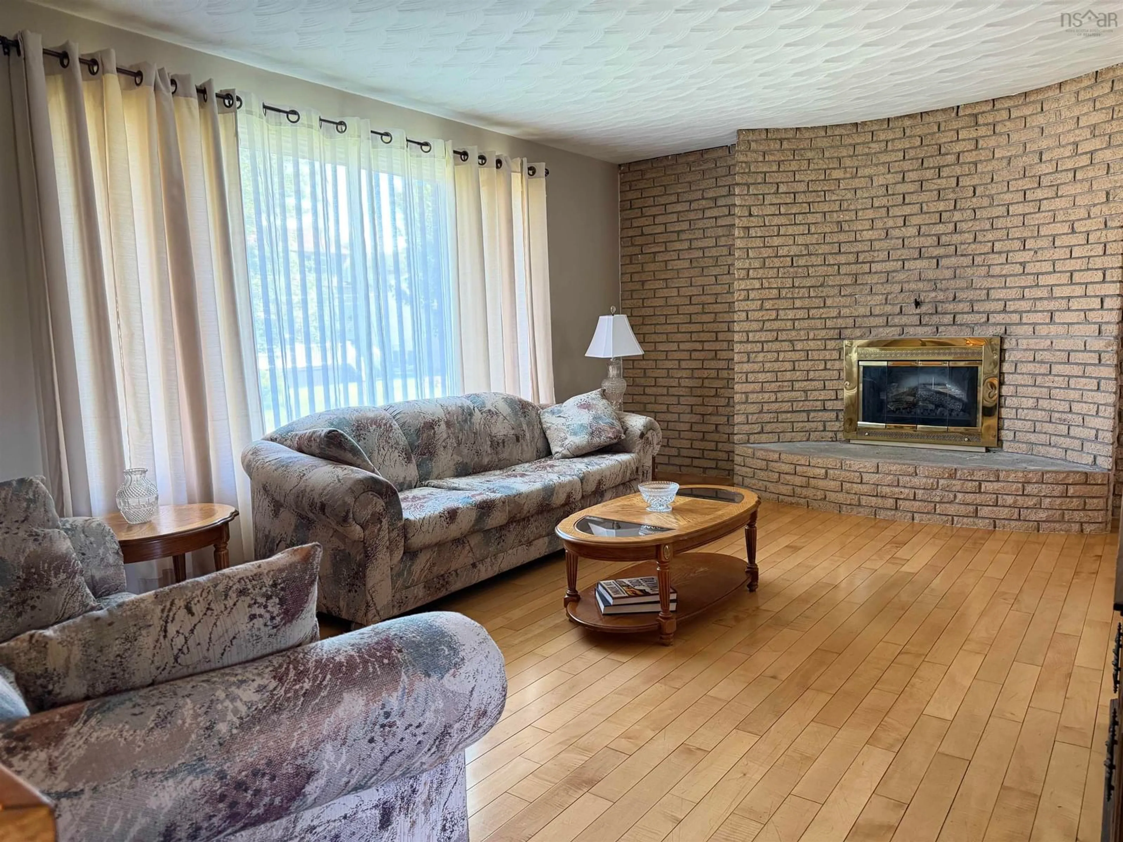 Living room with furniture, wood/laminate floor for 2 Edina St, Glace Bay Nova Scotia B1A 1G7