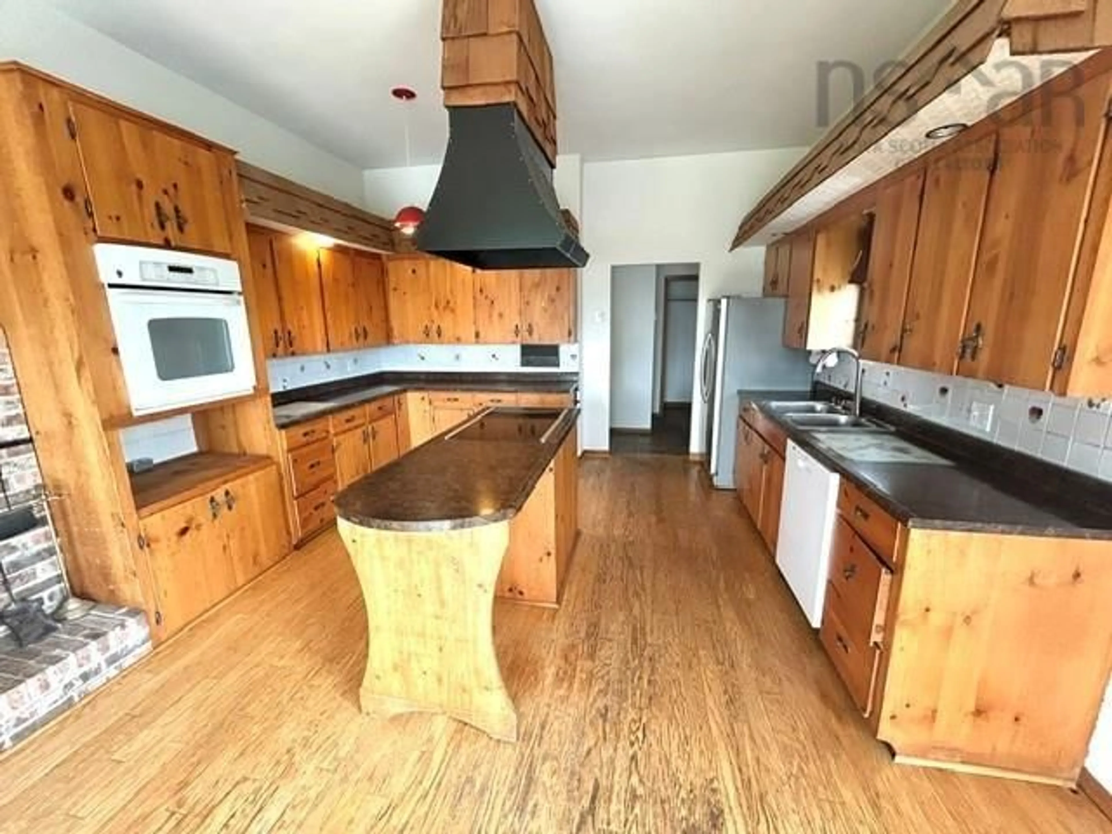 Open concept kitchen, wood/laminate floor for 903 Pictou Rd, East Mountain Nova Scotia B6L 2N1
