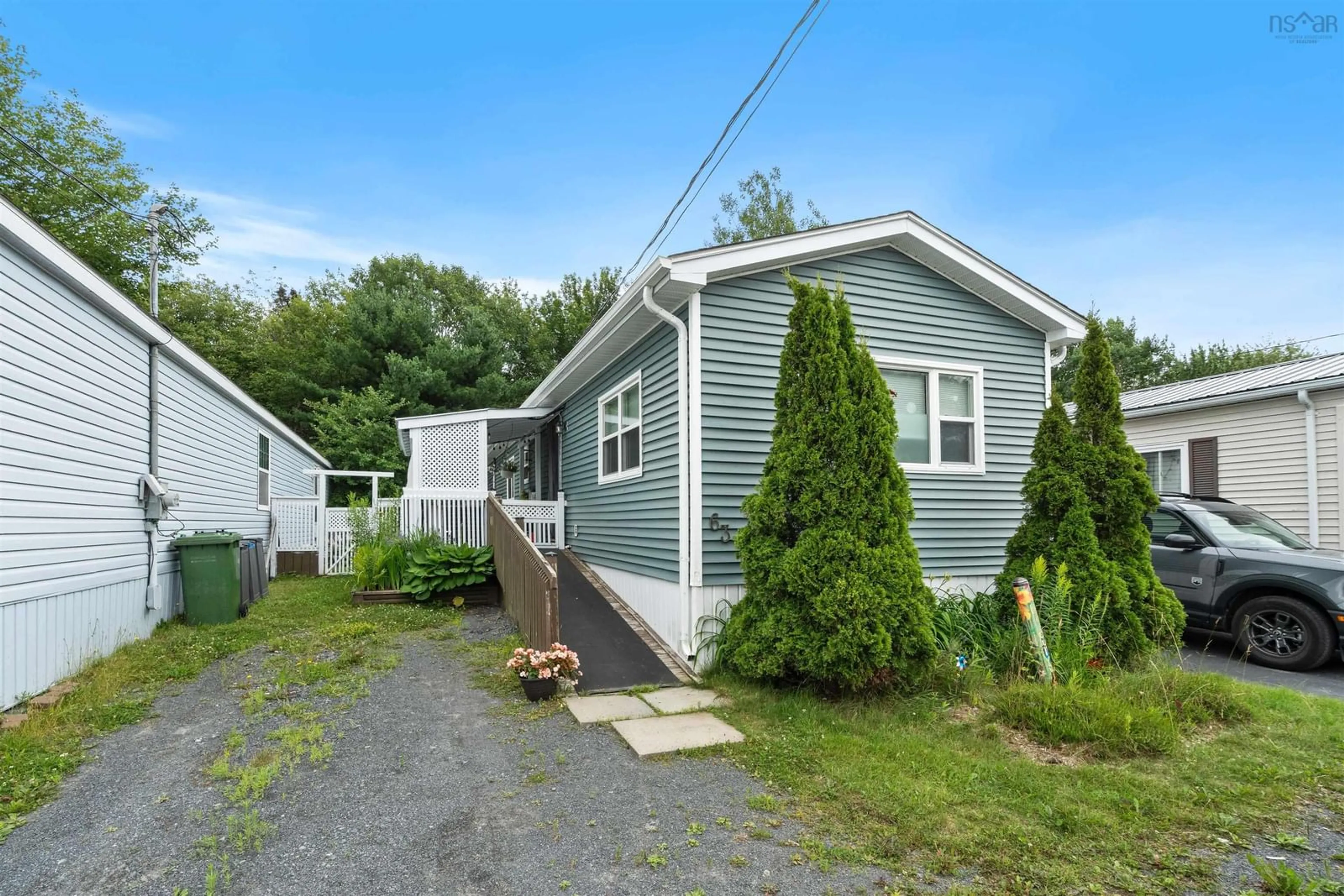 Home with vinyl exterior material, street for 63 Bridget Ave, Halifax Nova Scotia B3R 1H8