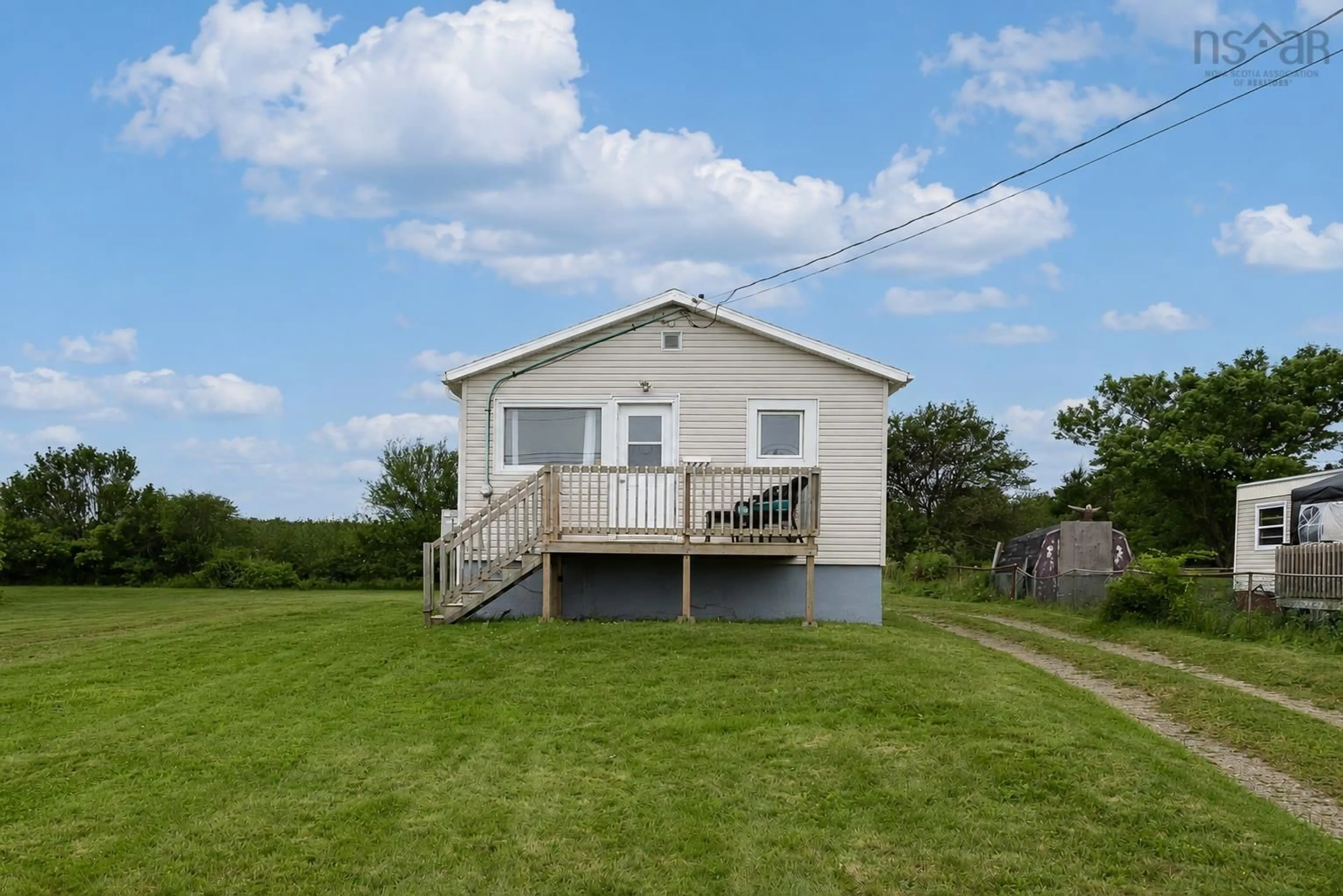 A pic from outside/outdoor area/front of a property/back of a property/a pic from drone, water/lake/river/ocean view for 3444 Emerald St, New Waterford Nova Scotia B1H 1H6