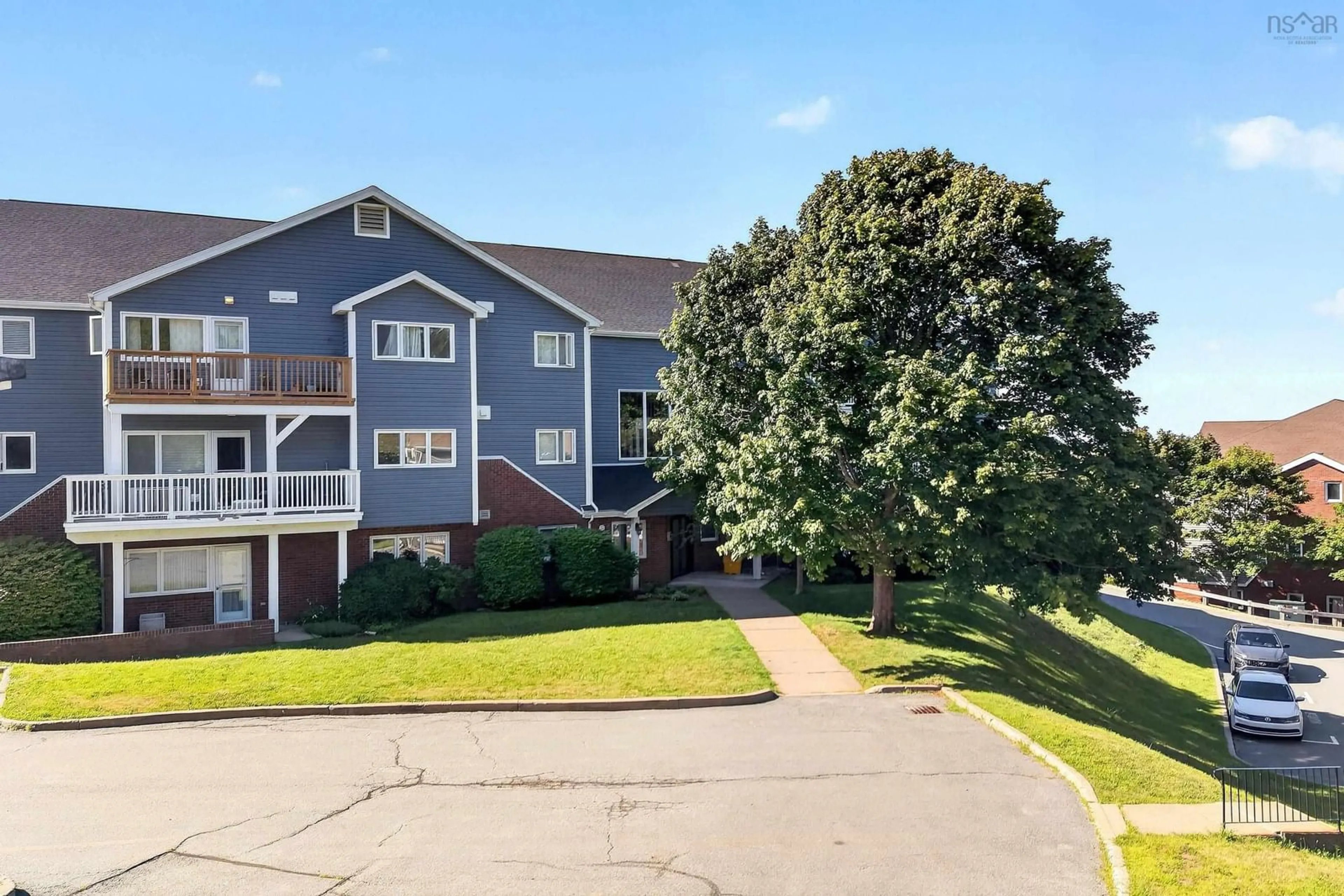 A pic from outside/outdoor area/front of a property/back of a property/a pic from drone, unknown for 126 Farnham Gate Rd #102, Halifax Nova Scotia B3M 3Z9