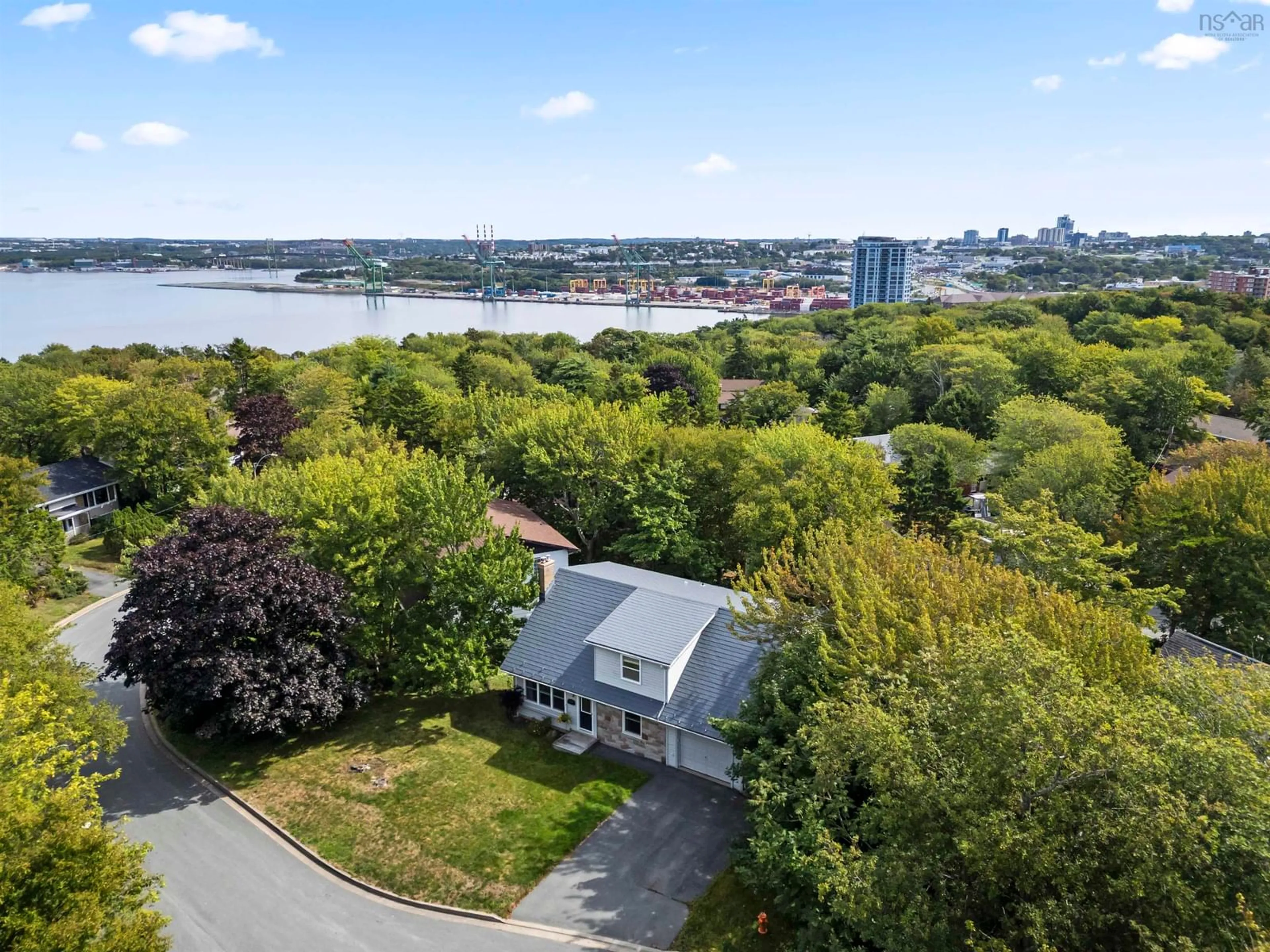 A pic from outside/outdoor area/front of a property/back of a property/a pic from drone, water/lake/river/ocean view for 8 Fox Glove Lane, Halifax Nova Scotia B3M 2R8