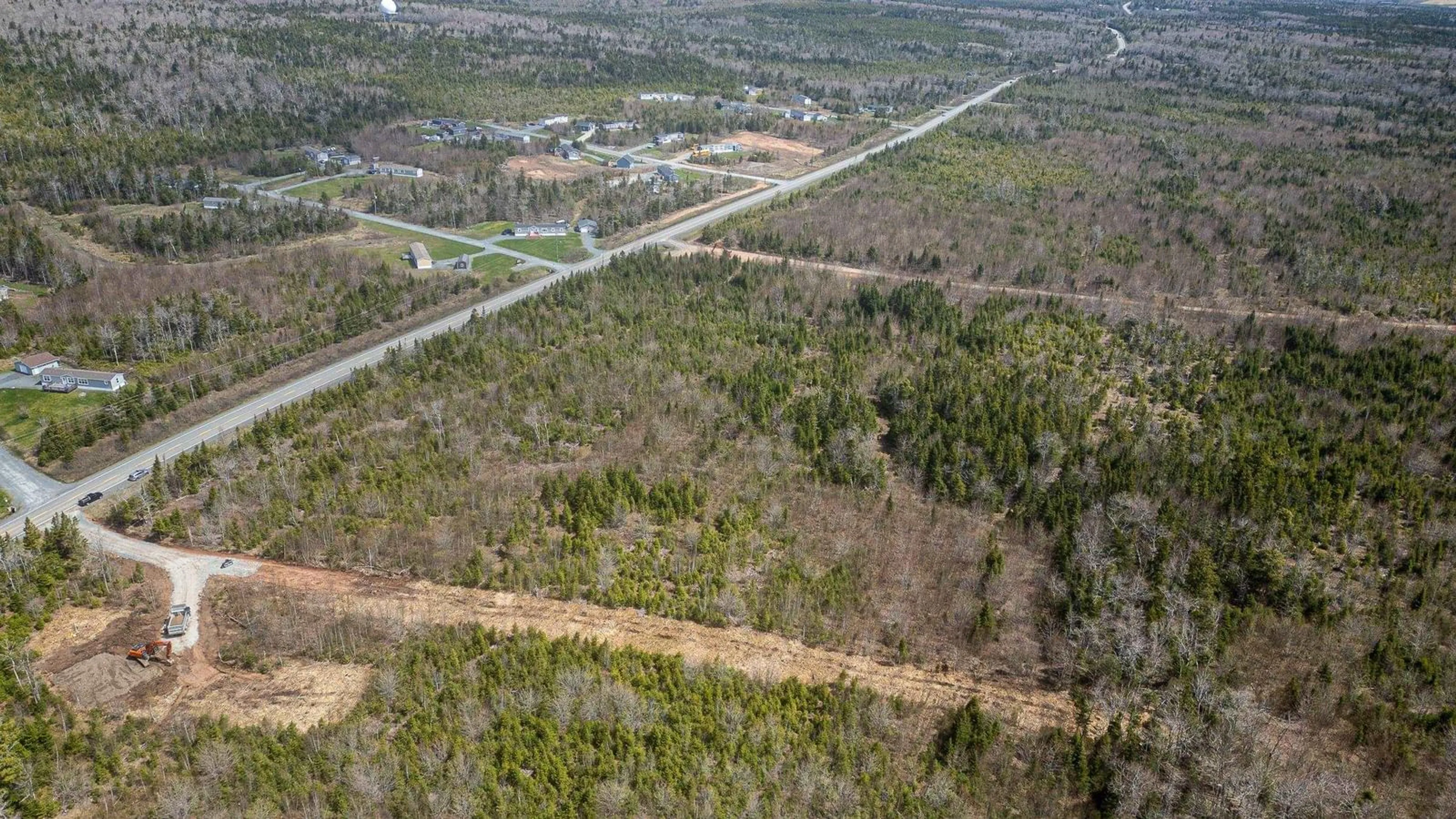 A pic from outside/outdoor area/front of a property/back of a property/a pic from drone, forest/trees view for 110 Old Guysborough Rd, Devon Nova Scotia B3T 1W8