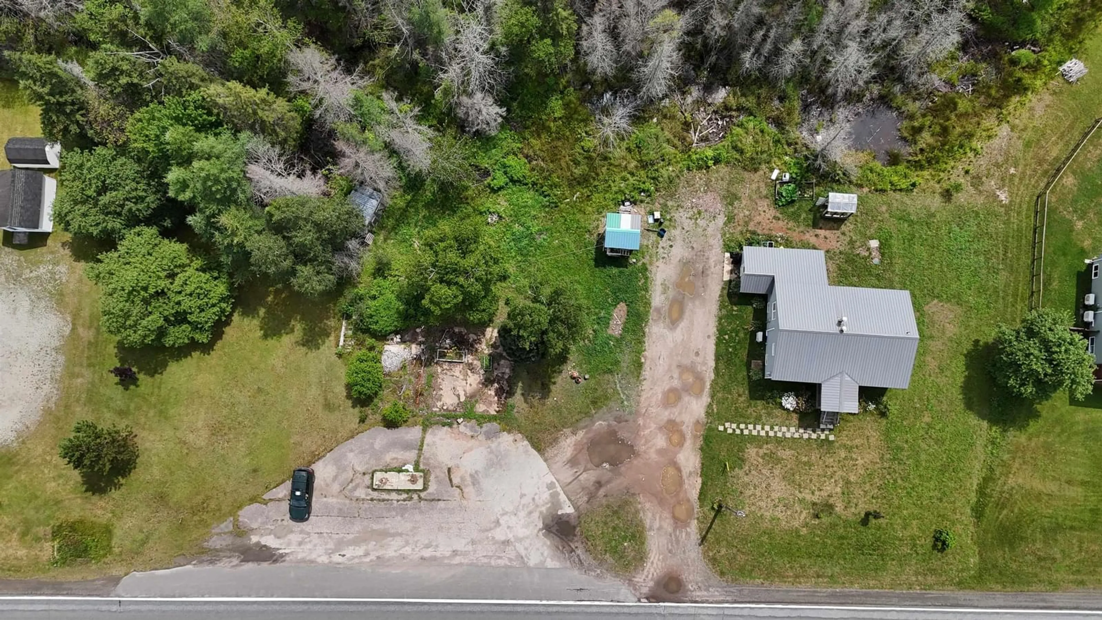 A pic from outside/outdoor area/front of a property/back of a property/a pic from drone, street for 6599 Cabot Trail, North East Margaree Nova Scotia B0E 2H0