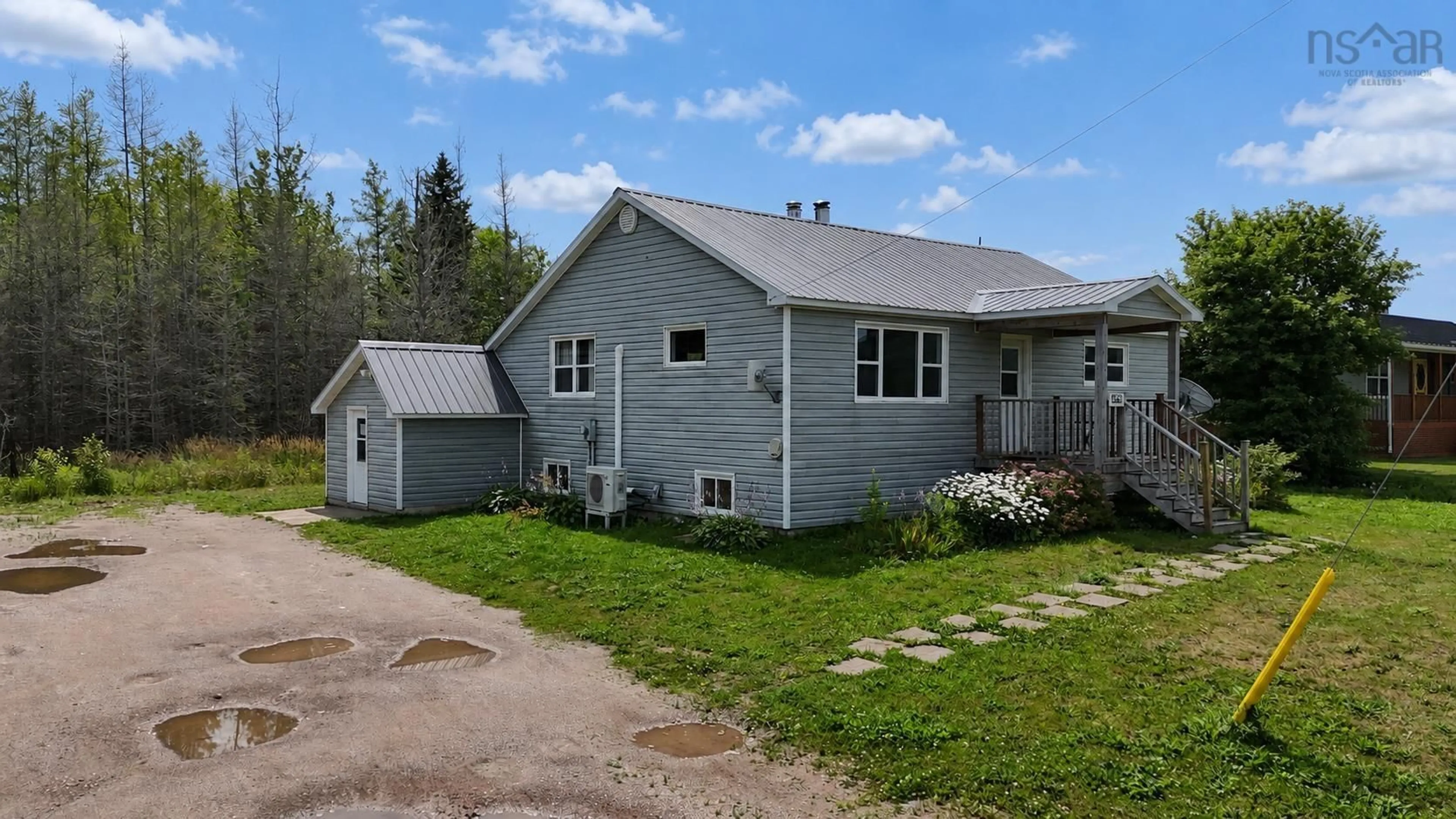A pic from outside/outdoor area/front of a property/back of a property/a pic from drone, street for 6599 Cabot Trail, North East Margaree Nova Scotia B0E 2H0