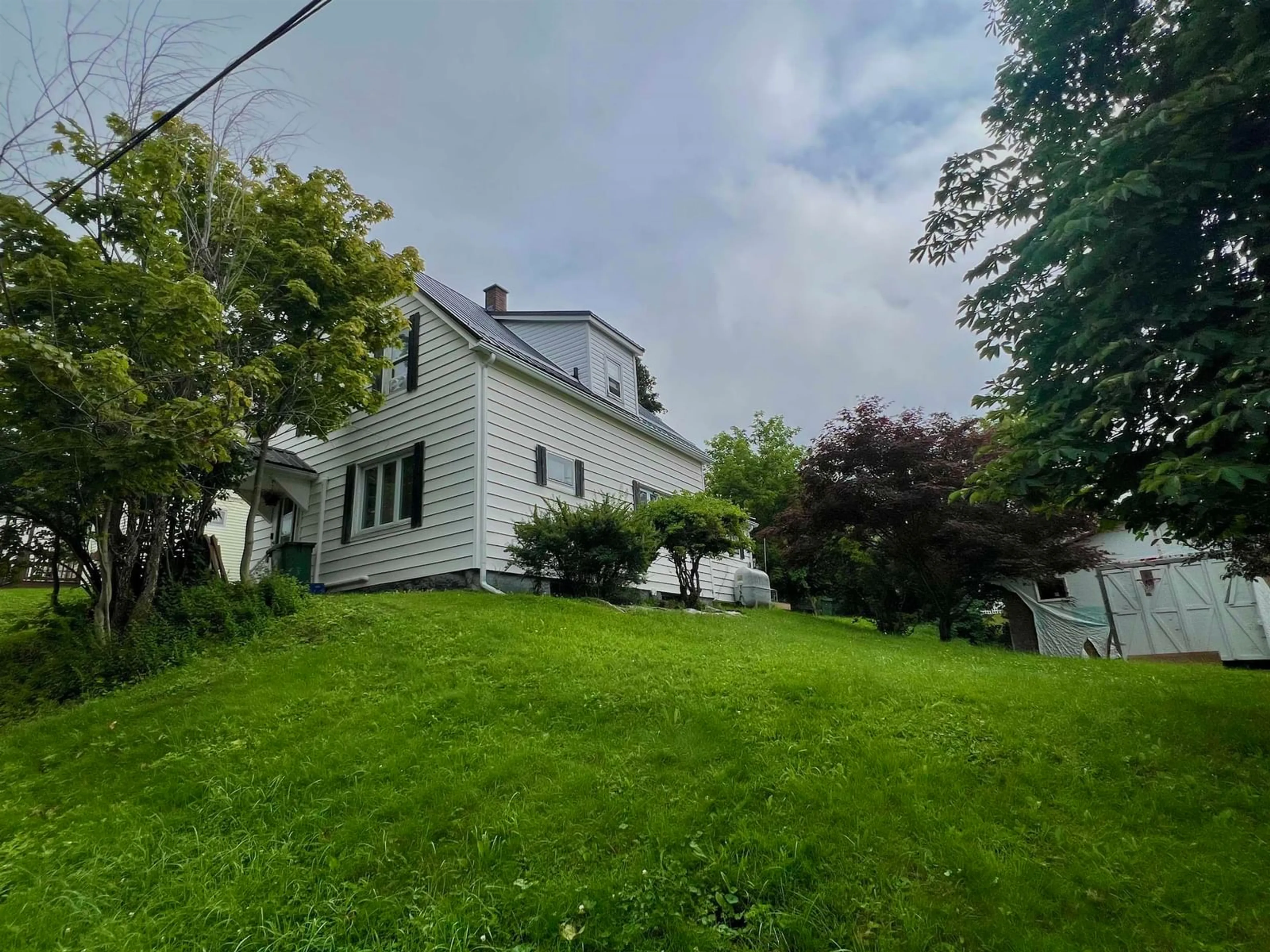 A pic from outside/outdoor area/front of a property/back of a property/a pic from drone, street for 2 Central Ave, Trenton Nova Scotia B0K 1X0