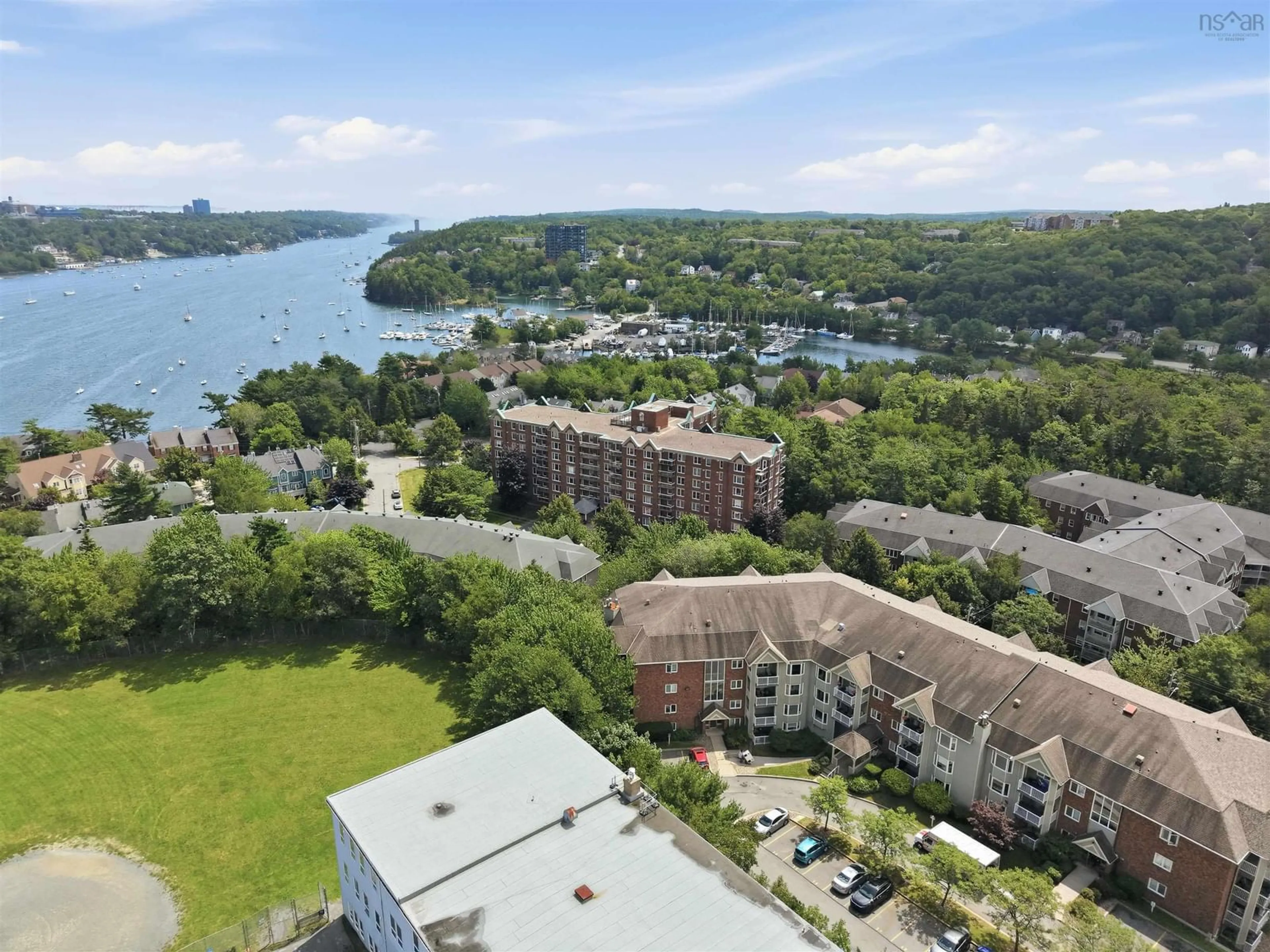 A pic from outside/outdoor area/front of a property/back of a property/a pic from drone, water/lake/river/ocean view for 85 Spinnaker Dr #206, Halifax Nova Scotia B3N 3E3