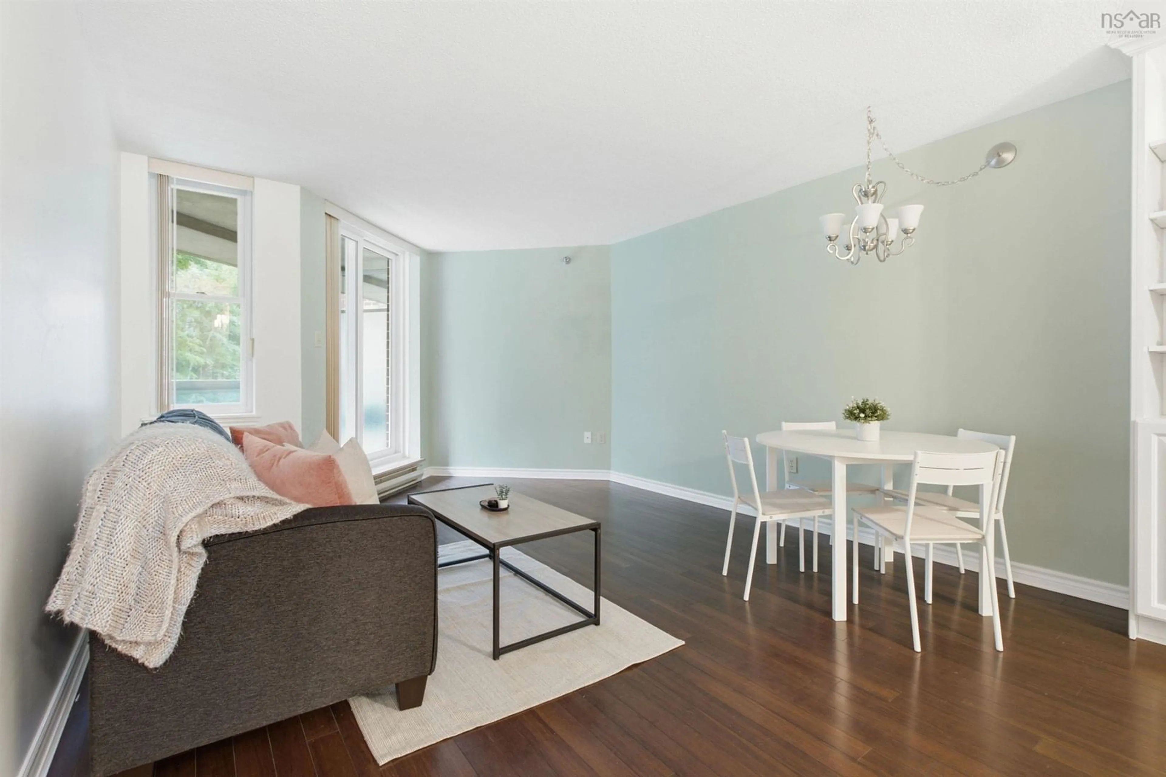 Living room with furniture, wood/laminate floor for 85 Spinnaker Dr #206, Halifax Nova Scotia B3N 3E3