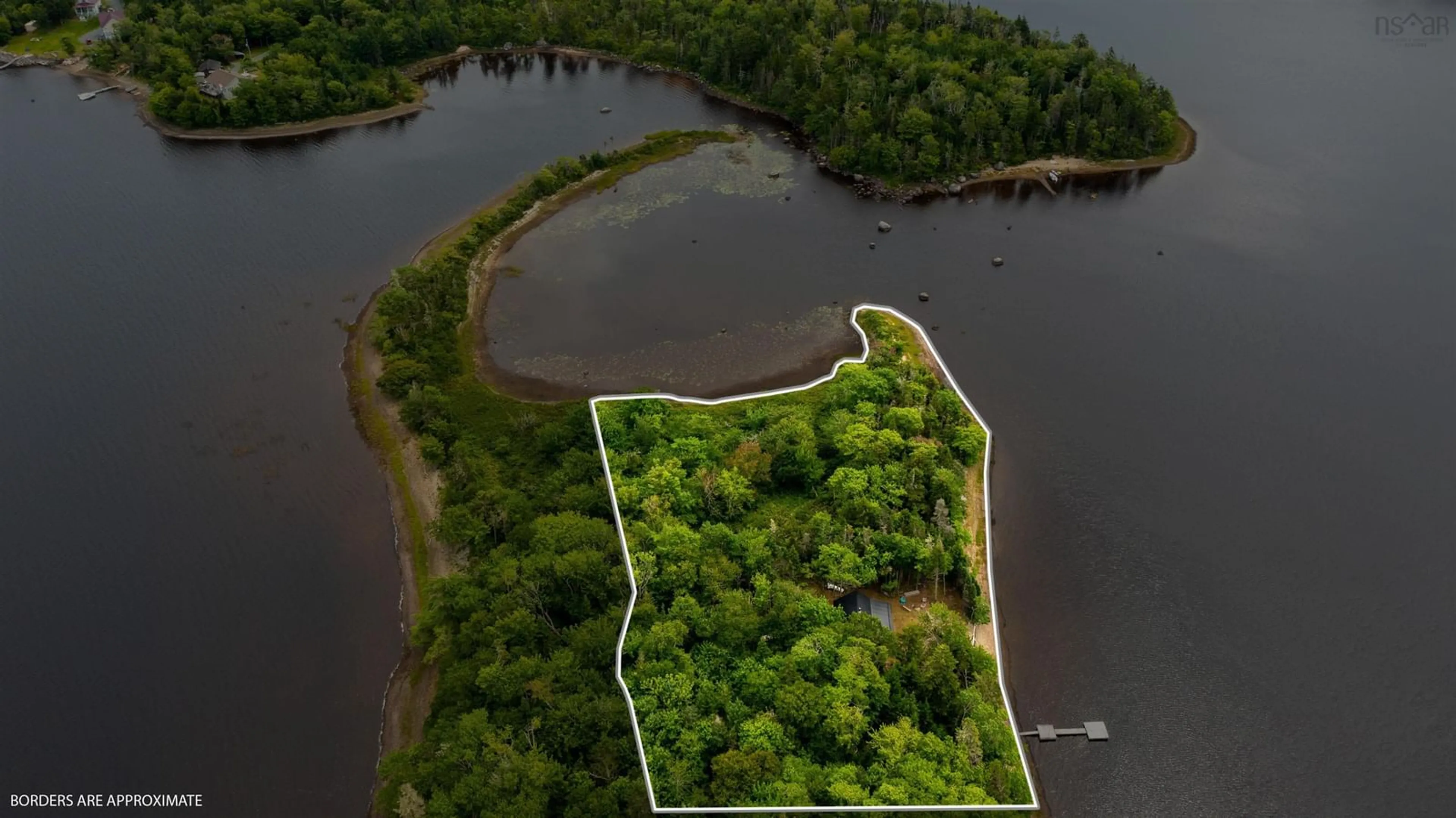 A pic from outside/outdoor area/front of a property/back of a property/a pic from drone, water/lake/river/ocean view for 2 Acres With Cottage Island No. 6, Lake Charlotte Nova Scotia B0J 2L0