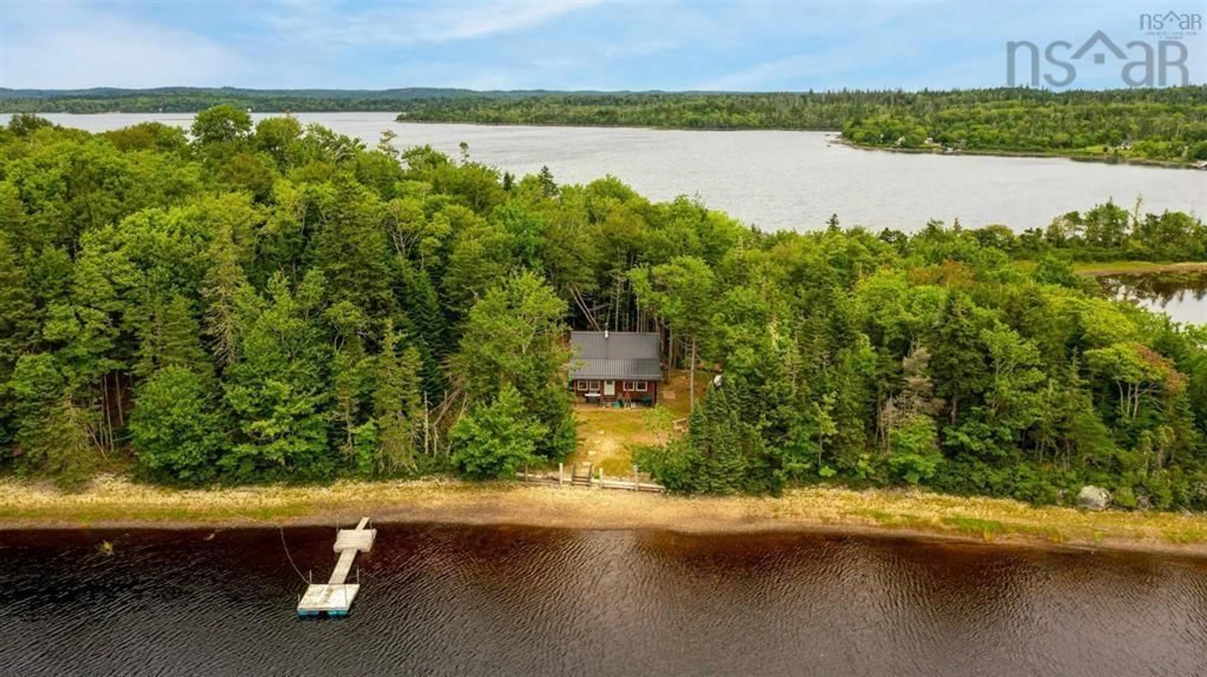A pic from outside/outdoor area/front of a property/back of a property/a pic from drone, water/lake/river/ocean view for 2 Acres With Cottage Island No. 6, Lake Charlotte Nova Scotia B0J 2L0