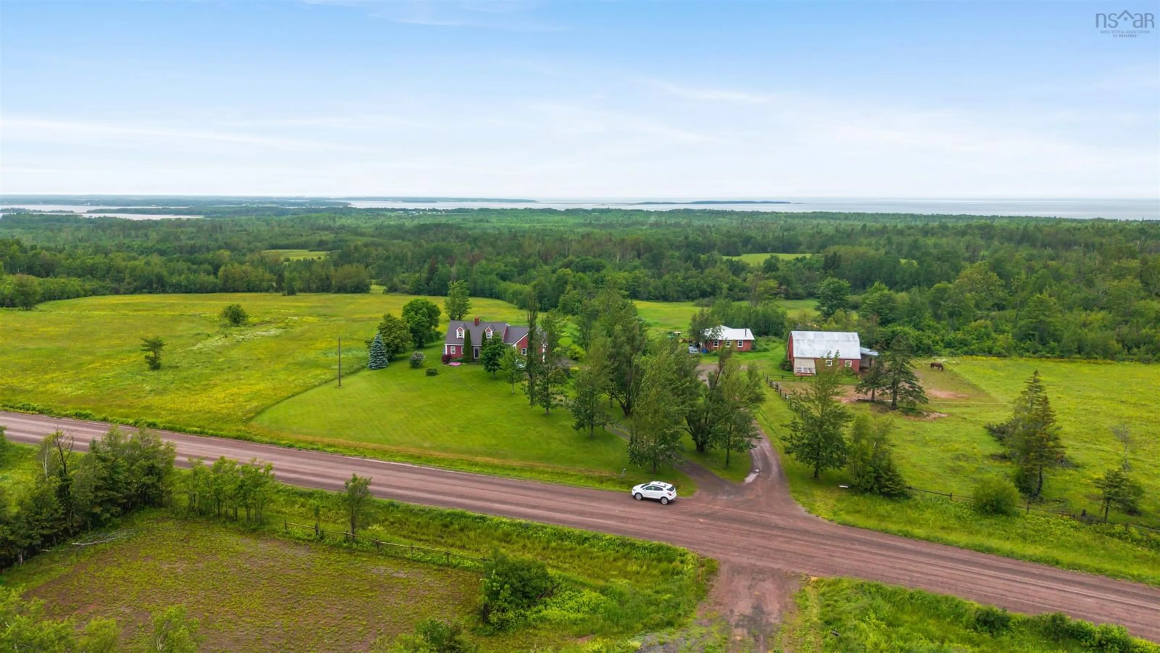 A pic from outside/outdoor area/front of a property/back of a property/a pic from drone, water/lake/river/ocean view for 199 Mcinnis Rd, Malagash Nova Scotia B0K 1E0