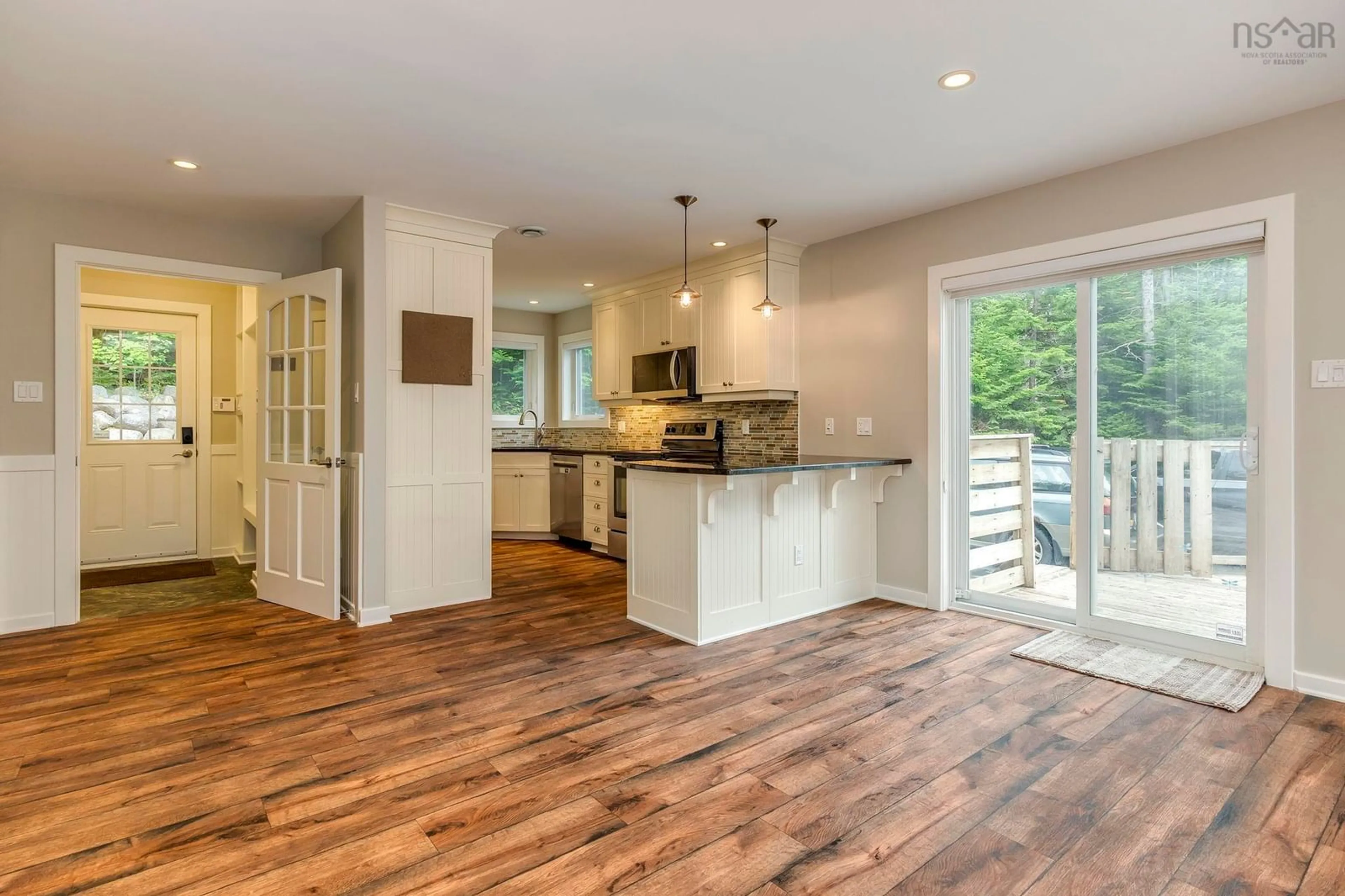 Open concept kitchen, wood/laminate floor for 12991 Peggys Cove Rd, Tantallon Nova Scotia B3Z 2K3