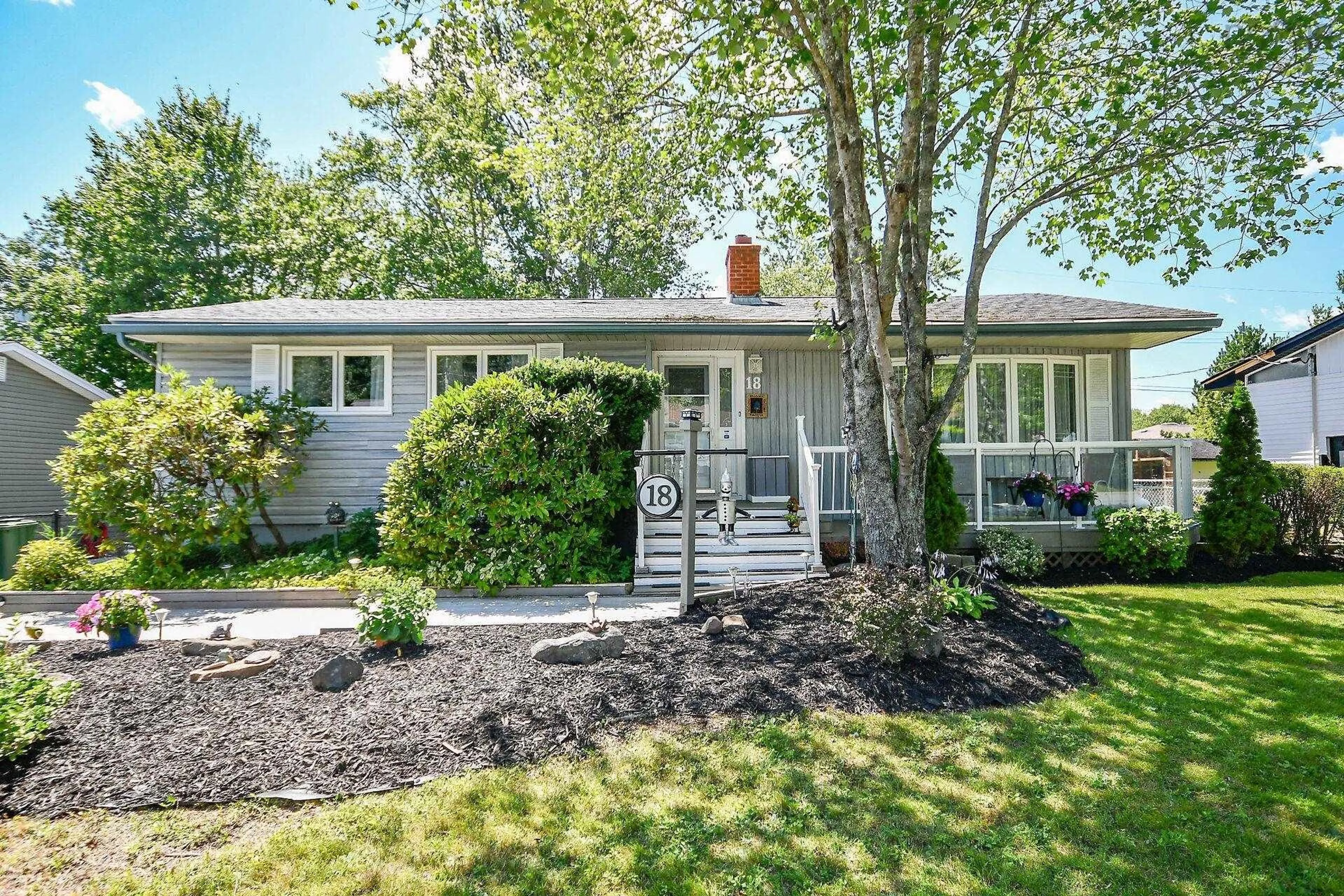 Home with vinyl exterior material, street for 18 Beaumont Dr, Lower Sackville Nova Scotia B4C 1V6