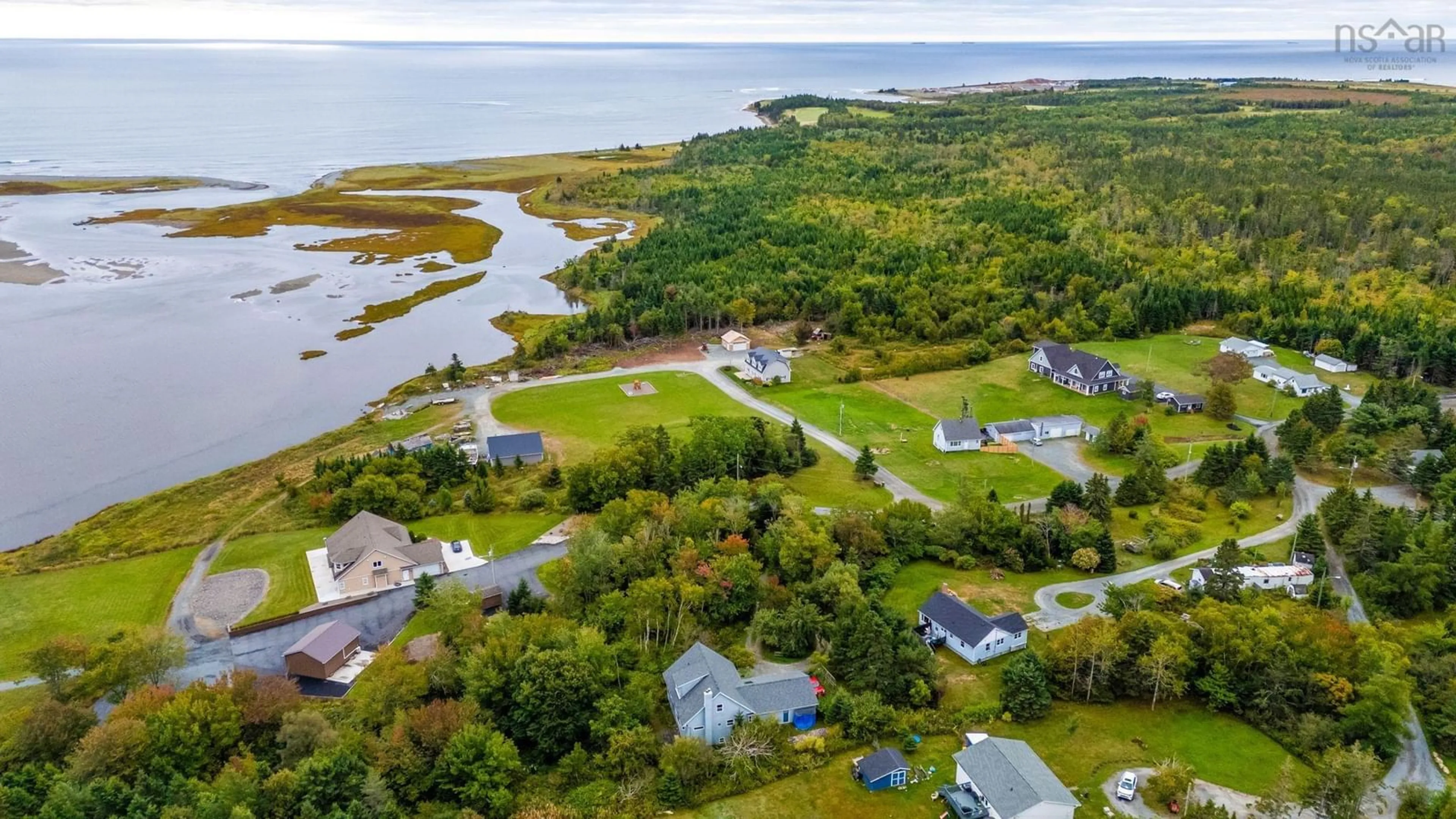 A pic from outside/outdoor area/front of a property/back of a property/a pic from drone, water/lake/river/ocean view for 70 Hurricane Lane, Eastern Passage Nova Scotia B3G 1S3