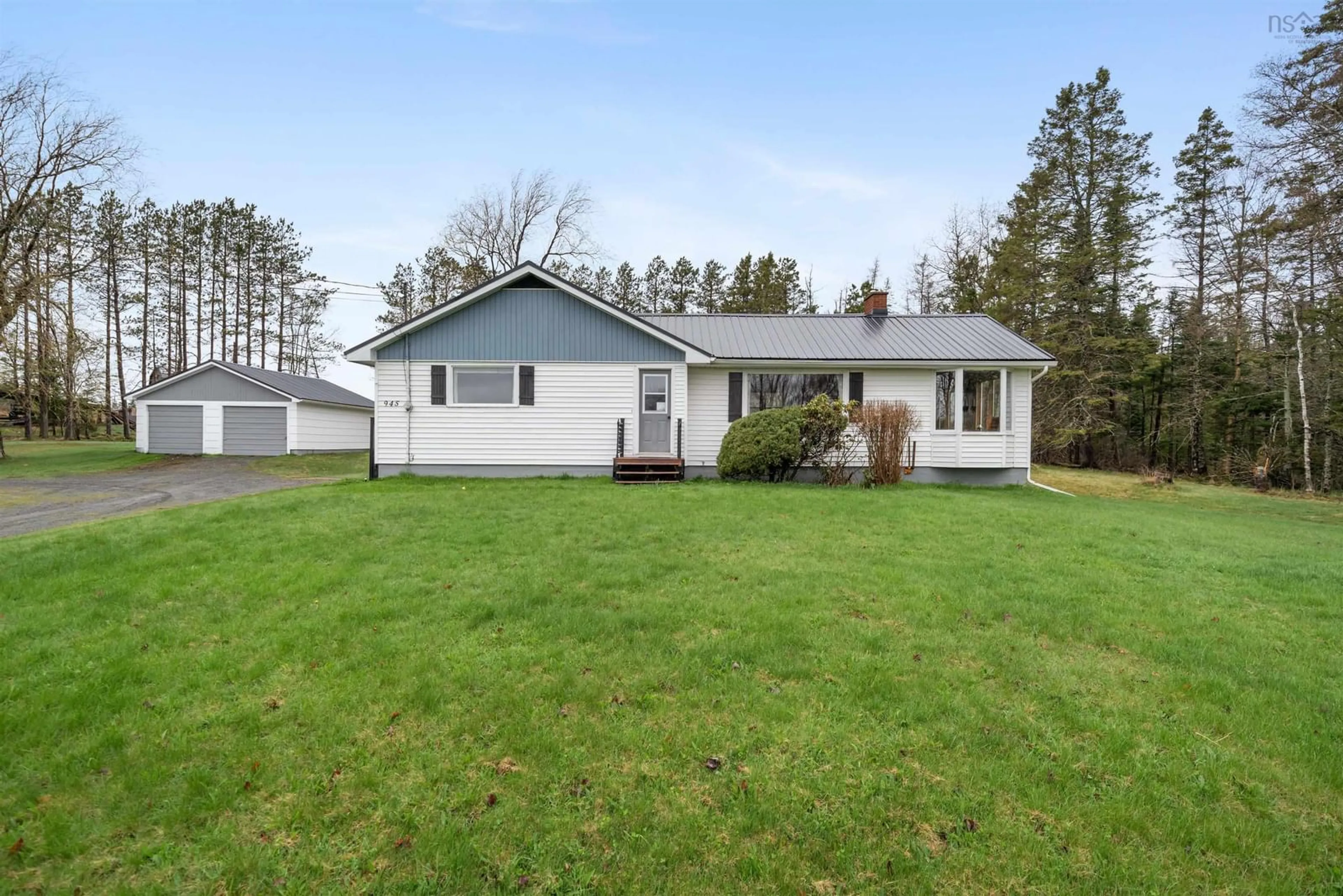 Home with vinyl exterior material, street for 945 Pictou Rd, East Mountain Nova Scotia B6L 2N1