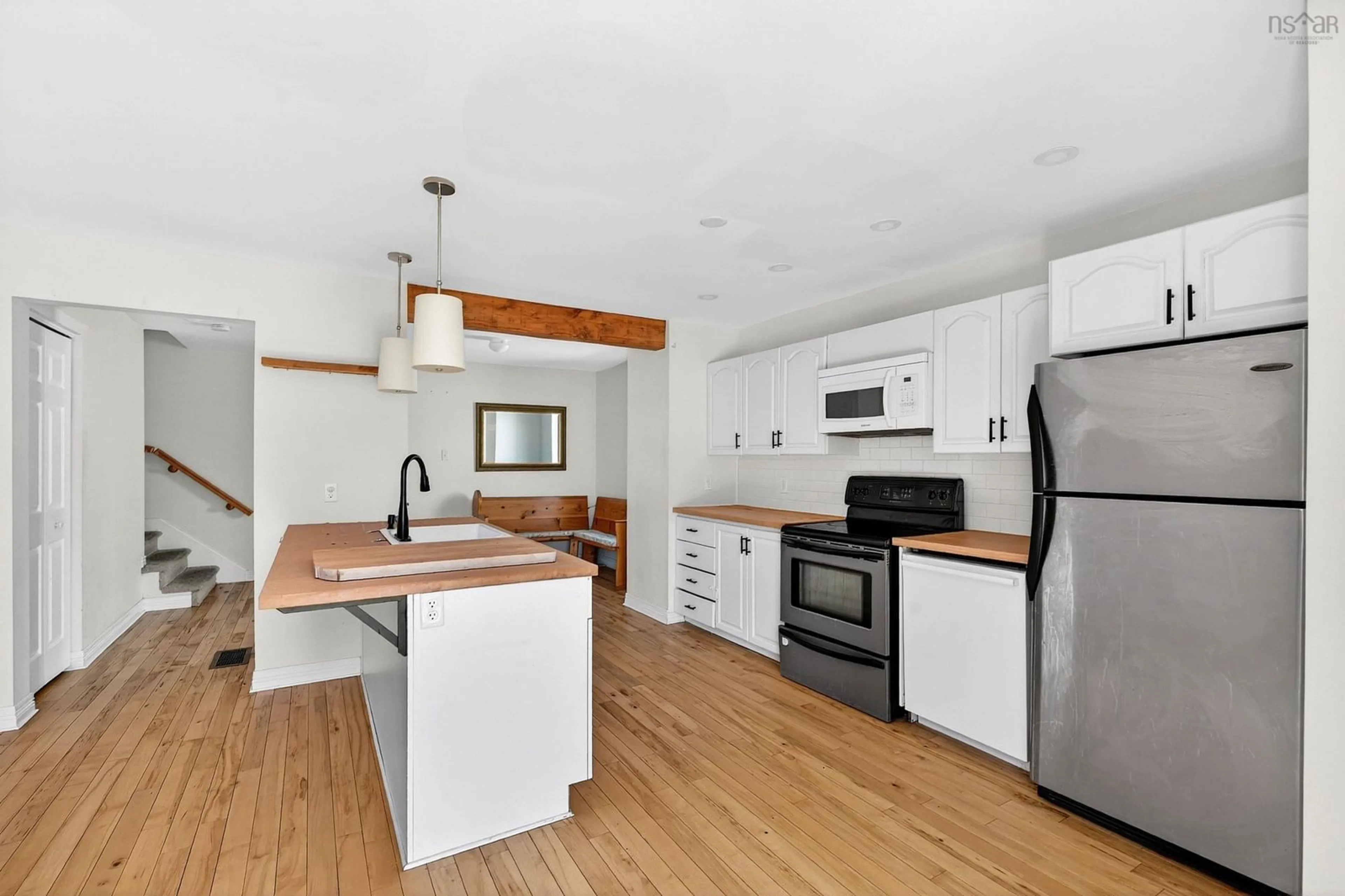 Open concept kitchen, wood/laminate floor for 38 Evans Ave, Halifax Nova Scotia B3M 1C2