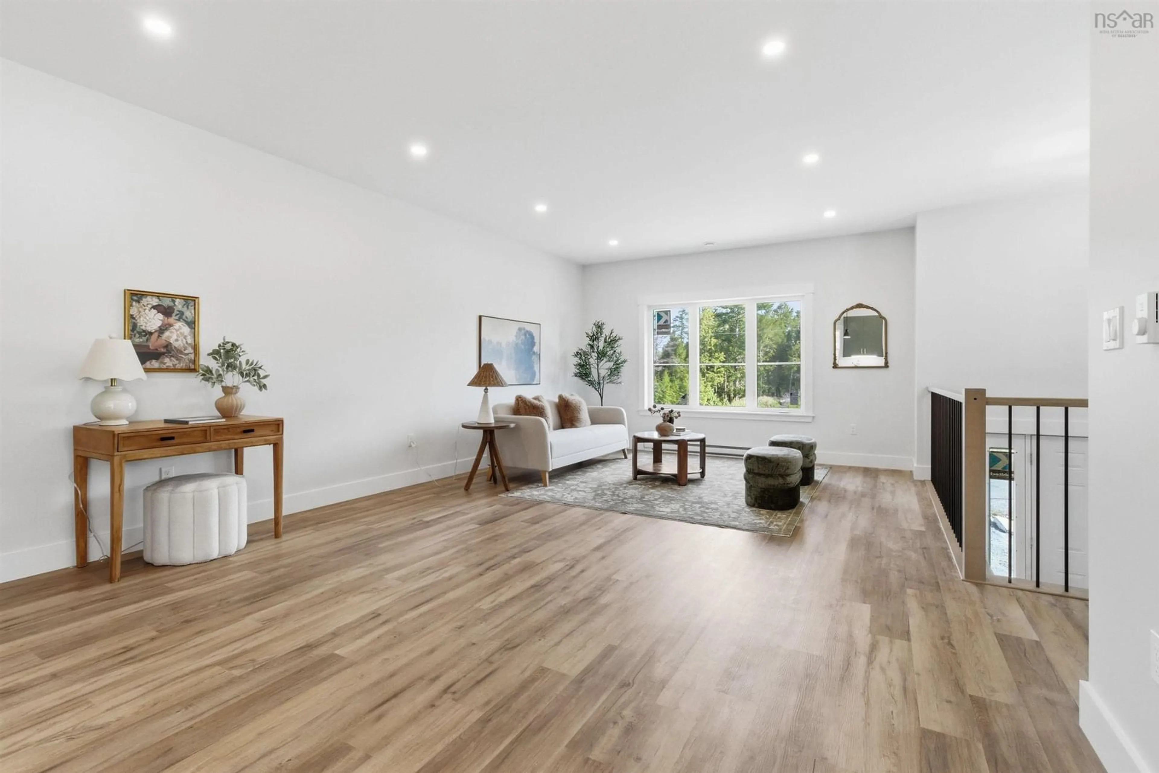 Living room with furniture, wood/laminate floor for 51 Pine Hill Dr, Elmsdale Nova Scotia B2S 1G8