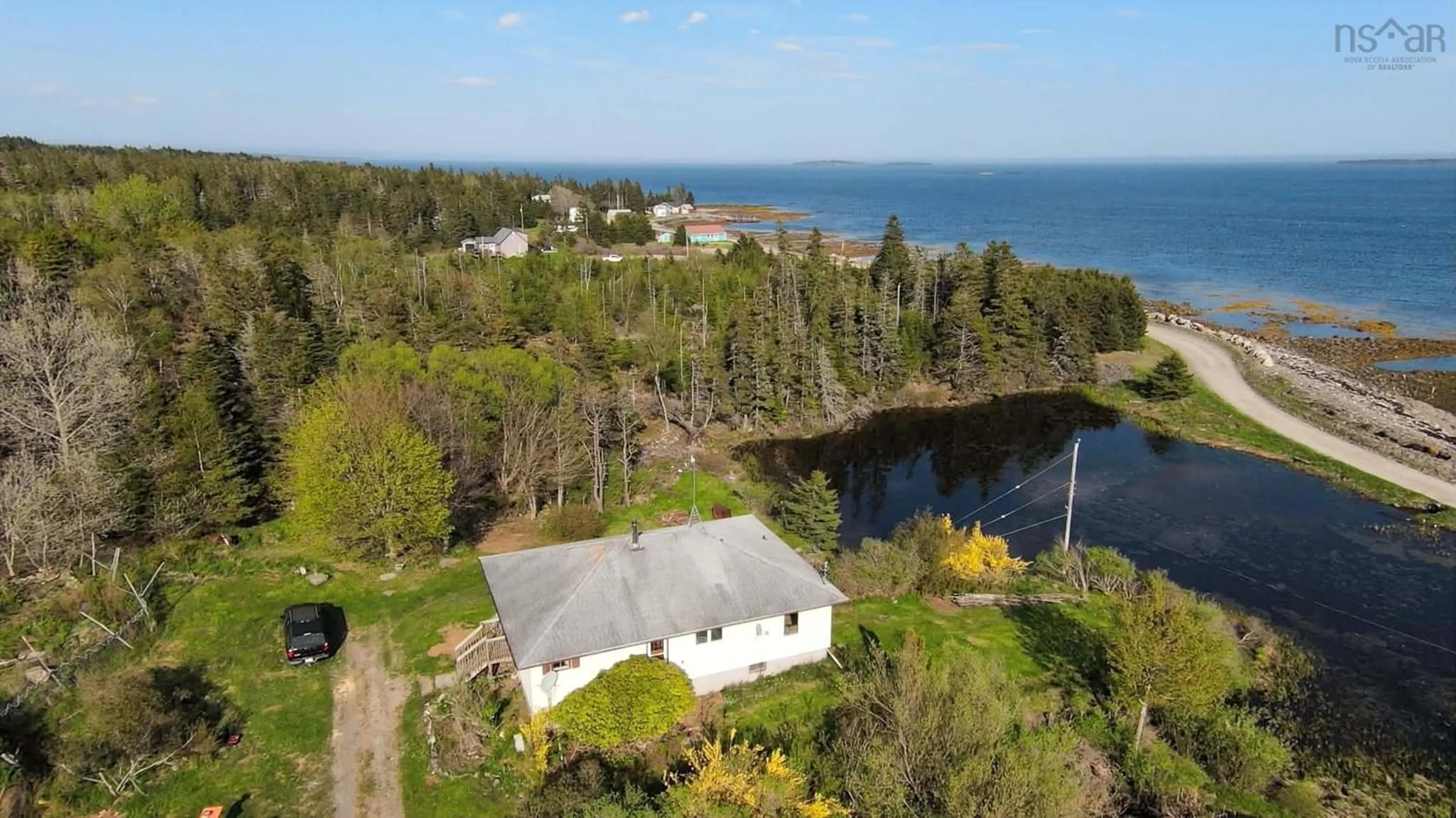 A pic from outside/outdoor area/front of a property/back of a property/a pic from drone, water/lake/river/ocean view for 149 South East Cove Rd, Big Tancook Island Nova Scotia B0J 3G0