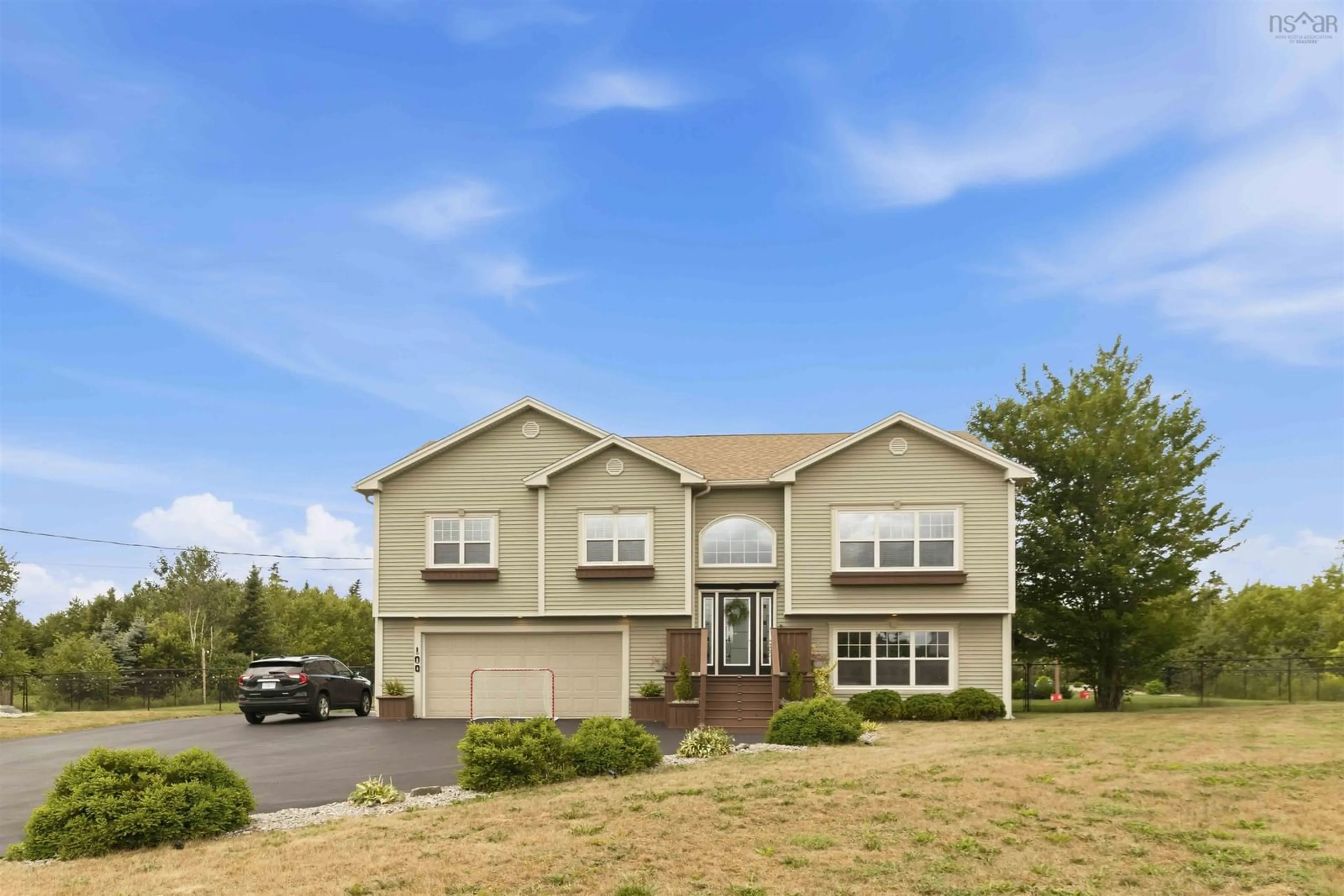 Home with vinyl exterior material, street for 100 Morgan Dr, Lawrencetown Nova Scotia B2Z 1V6