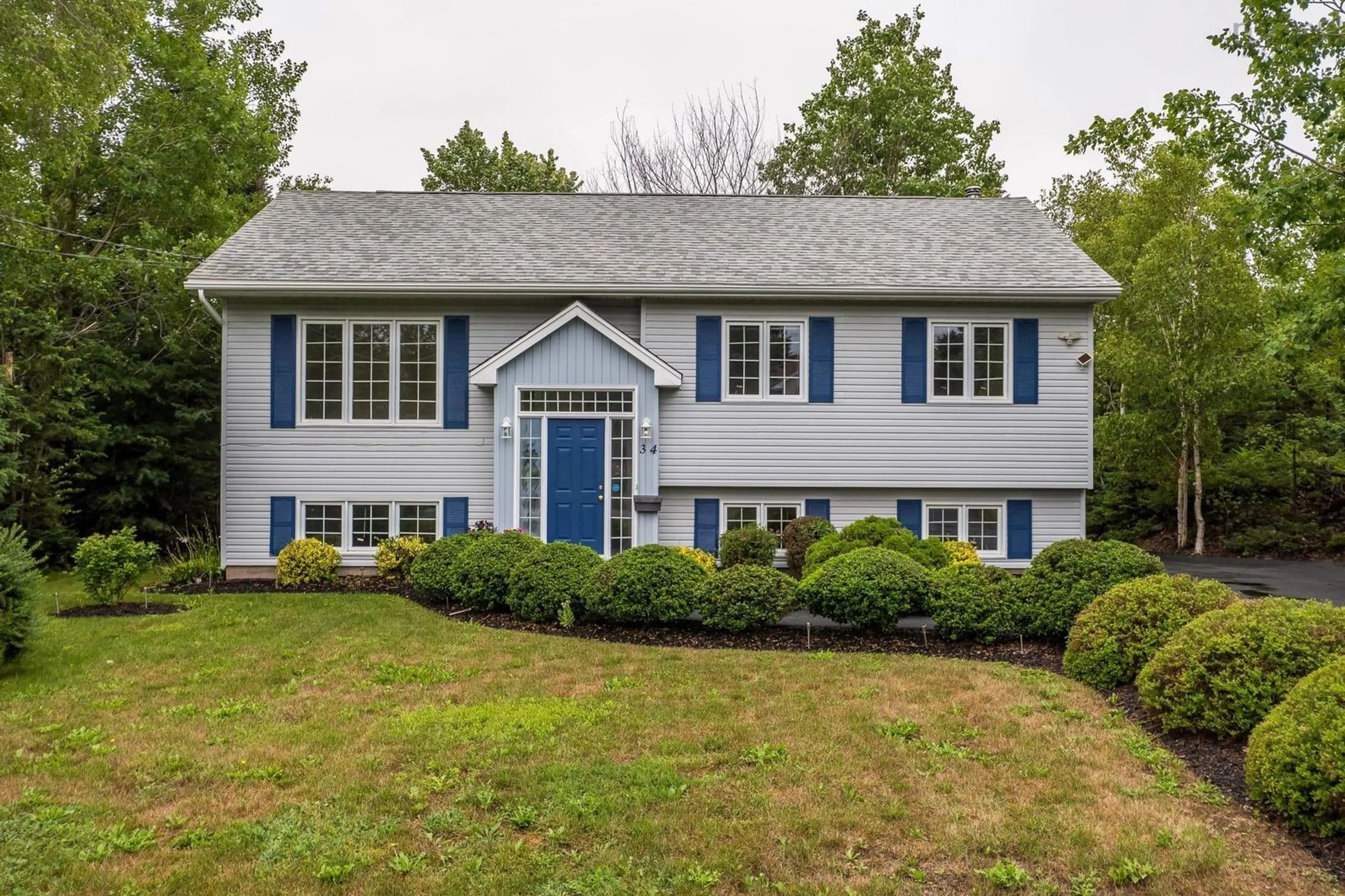 Home with vinyl exterior material, street for 34 Kenora Dr, Cole Harbour Nova Scotia B2Z 1J1