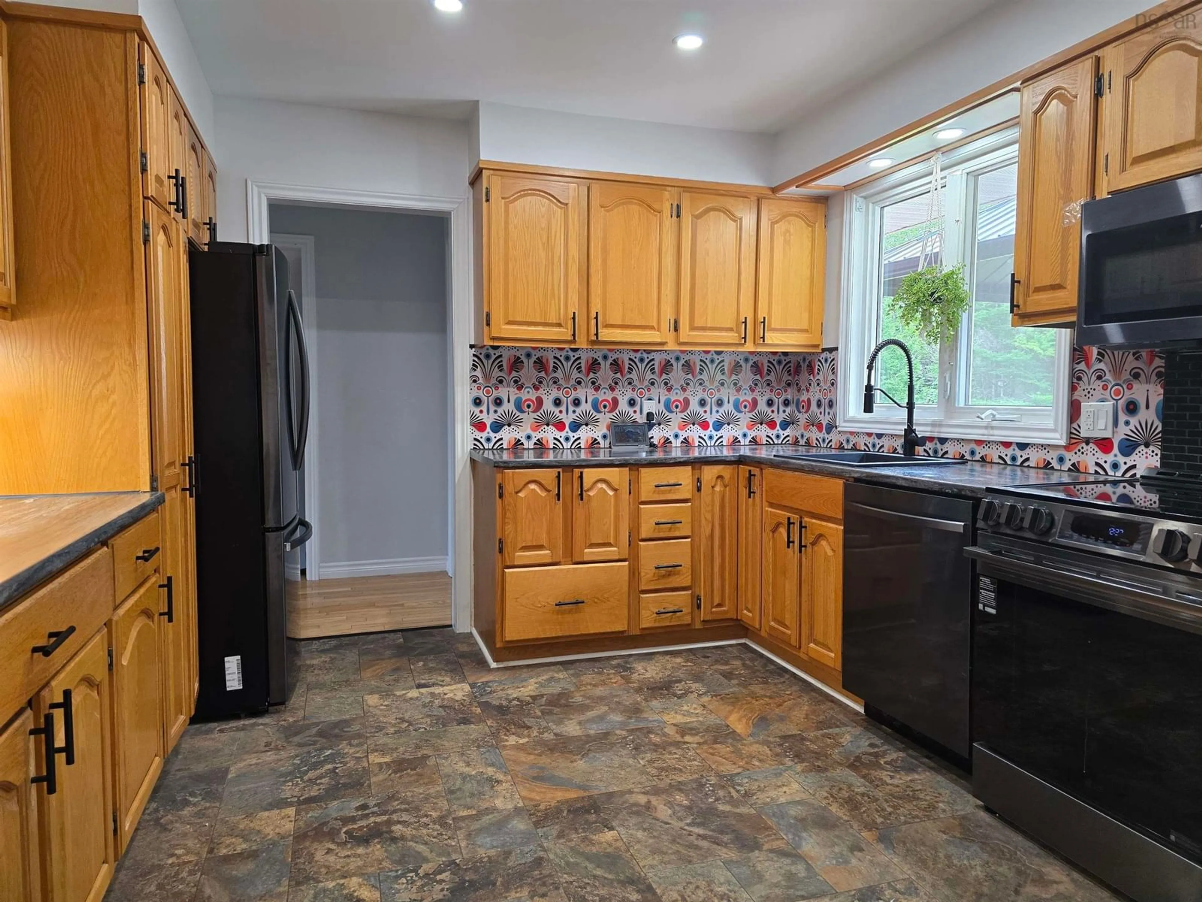 Standard kitchen, ceramic/tile floor for 612 Greenfield Rd, Murray Siding Nova Scotia B6L 3N1