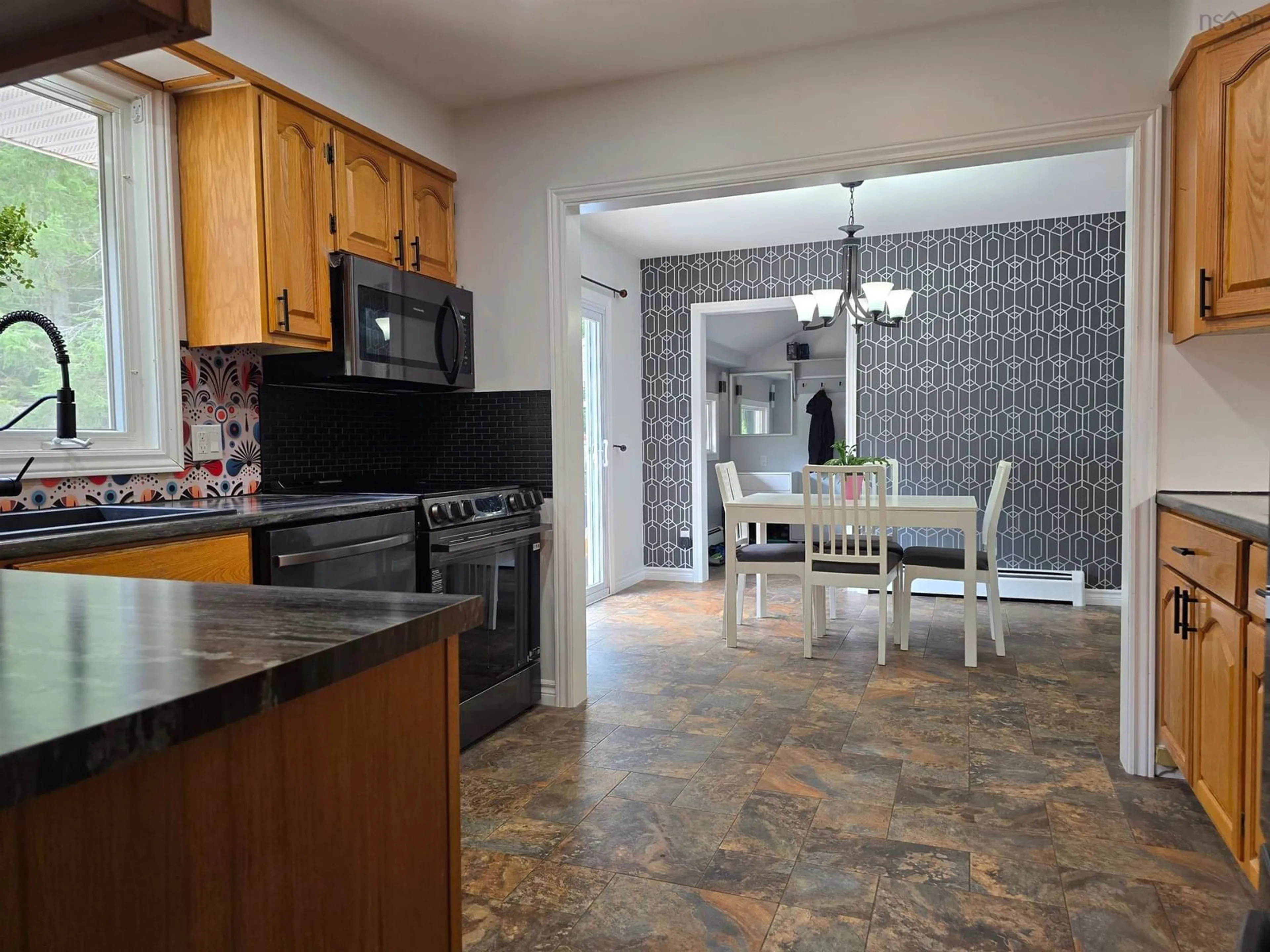 Open concept kitchen, ceramic/tile floor for 612 Greenfield Rd, Murray Siding Nova Scotia B6L 3N1