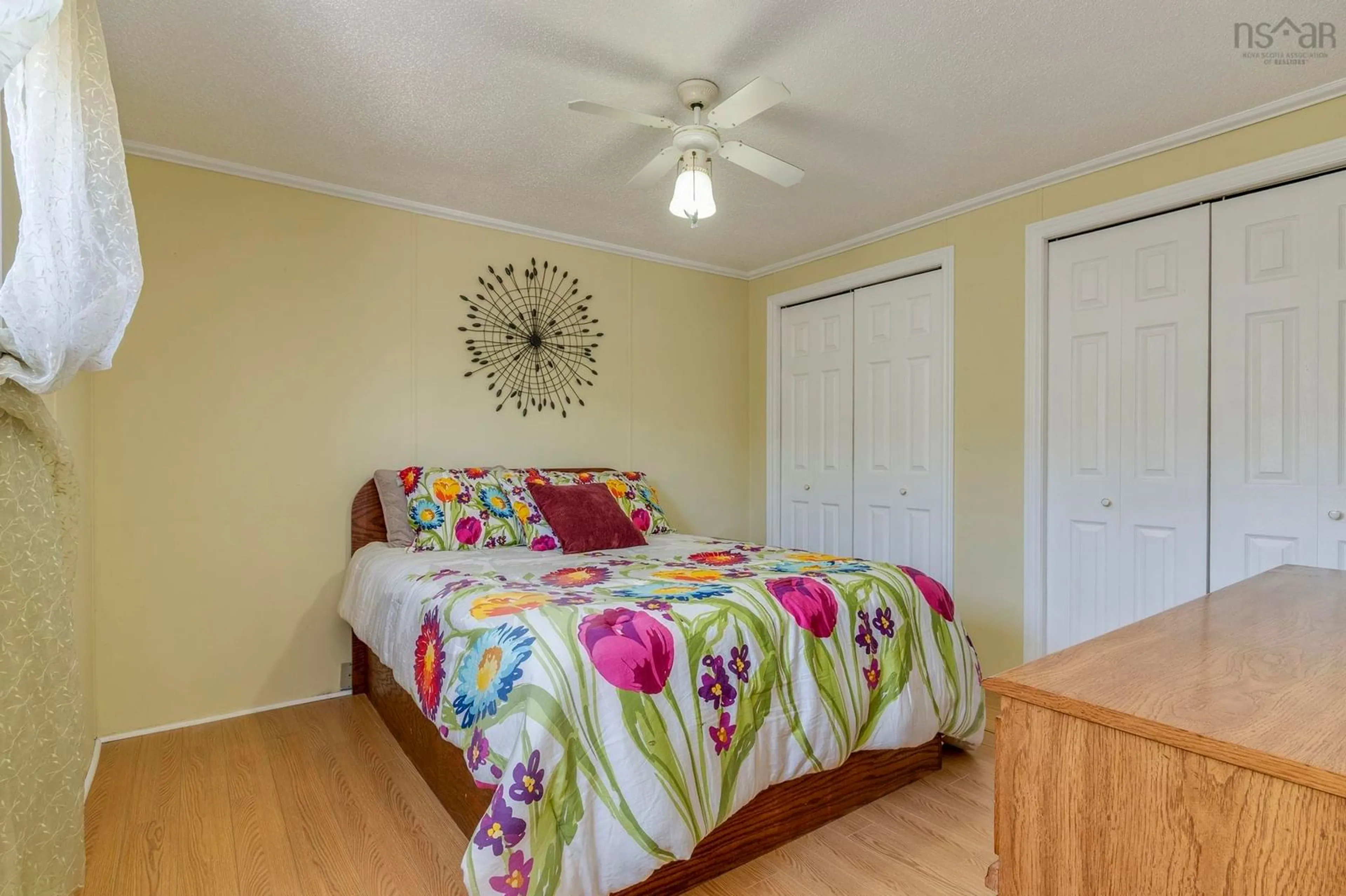 Bedroom with bed, wood/laminate floor for 38 That St, Porters Lake Nova Scotia B3E 1H3