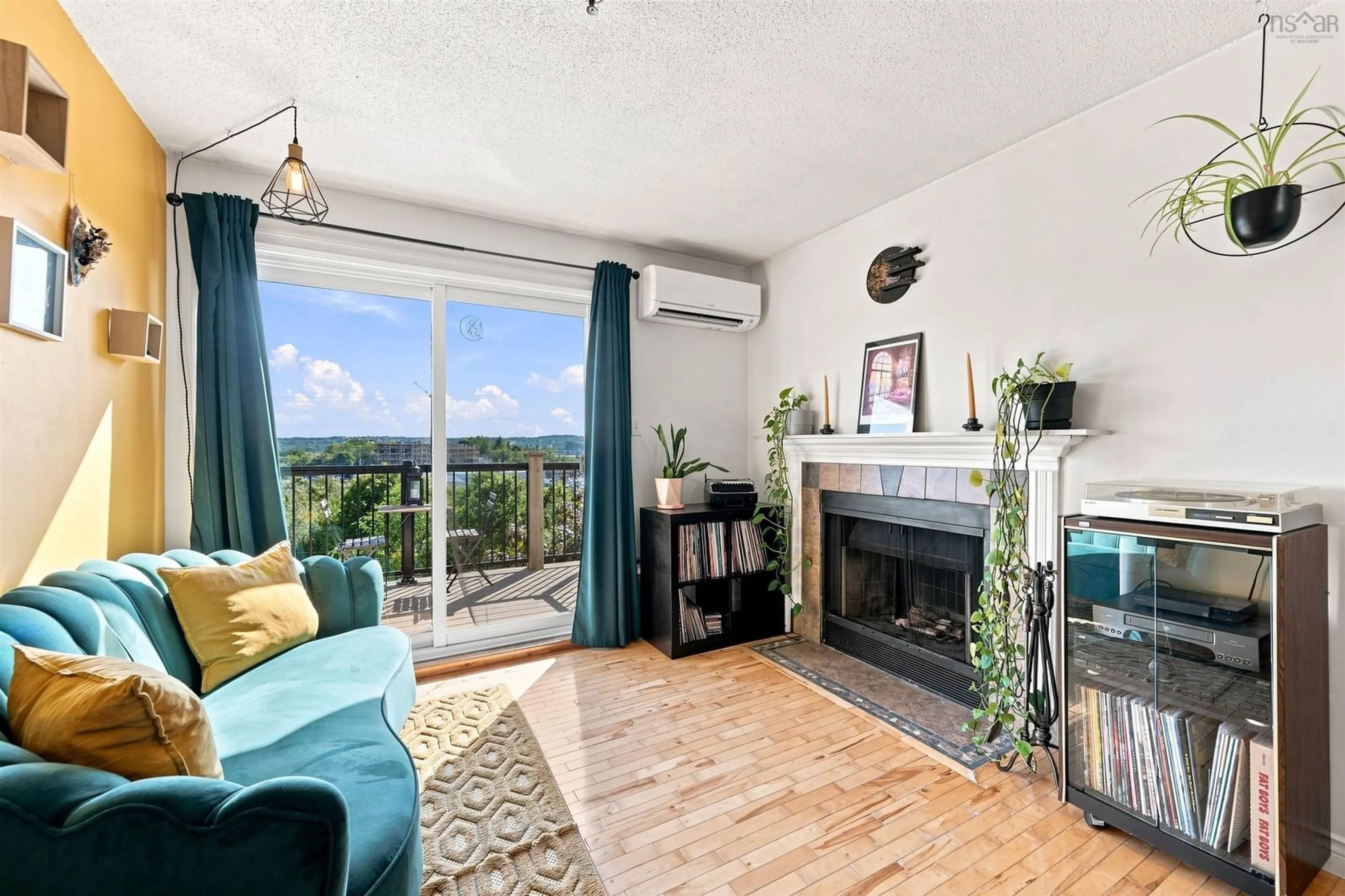 Living room with furniture, wood/laminate floor for 3600 John Parr Dr #401, Halifax Nova Scotia B3K 5V3