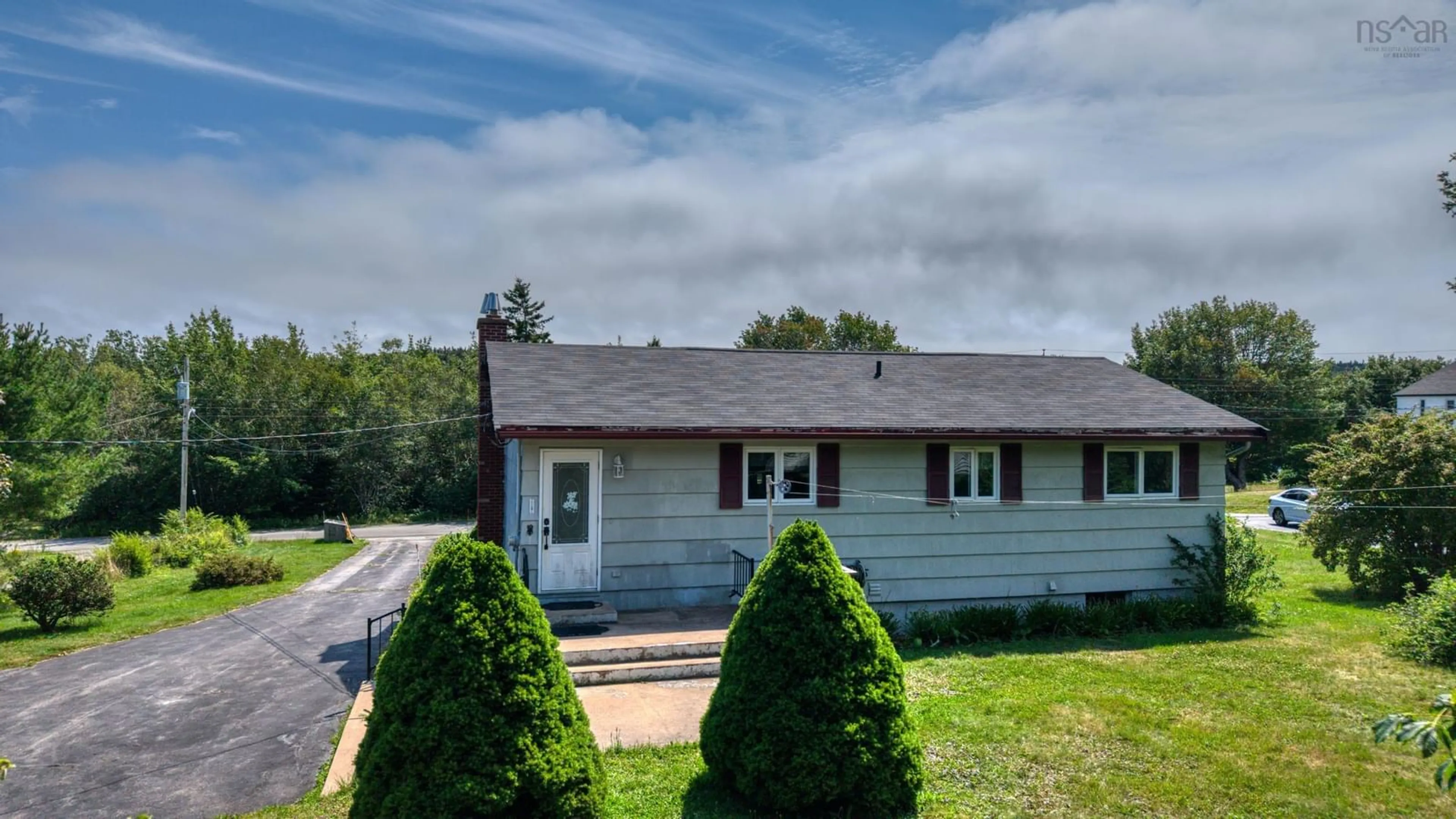 A pic from outside/outdoor area/front of a property/back of a property/a pic from drone, street for 56 North Side Rd, Riverport Nova Scotia B0J 2W0